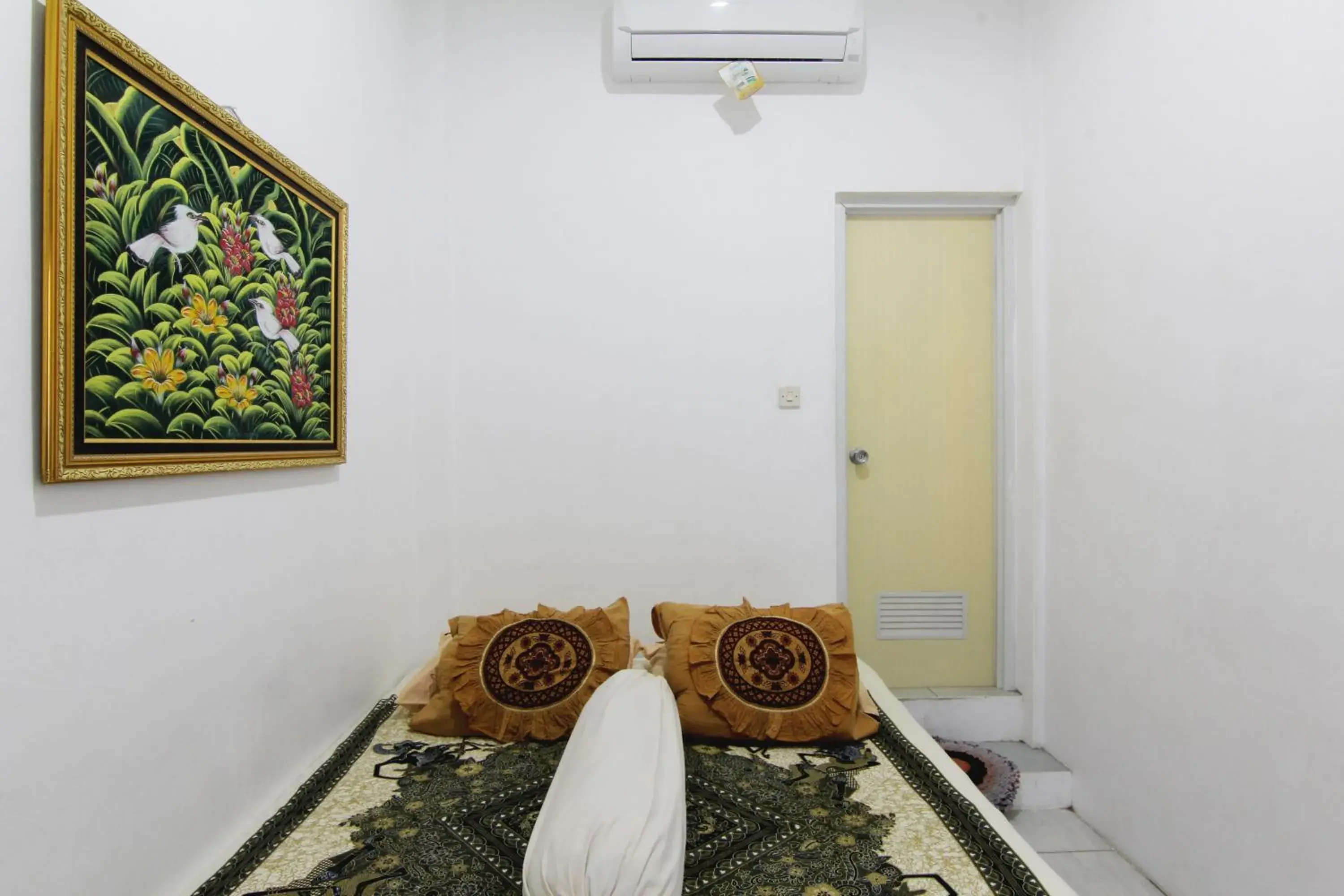 Bed in Tiga Dua Homestay