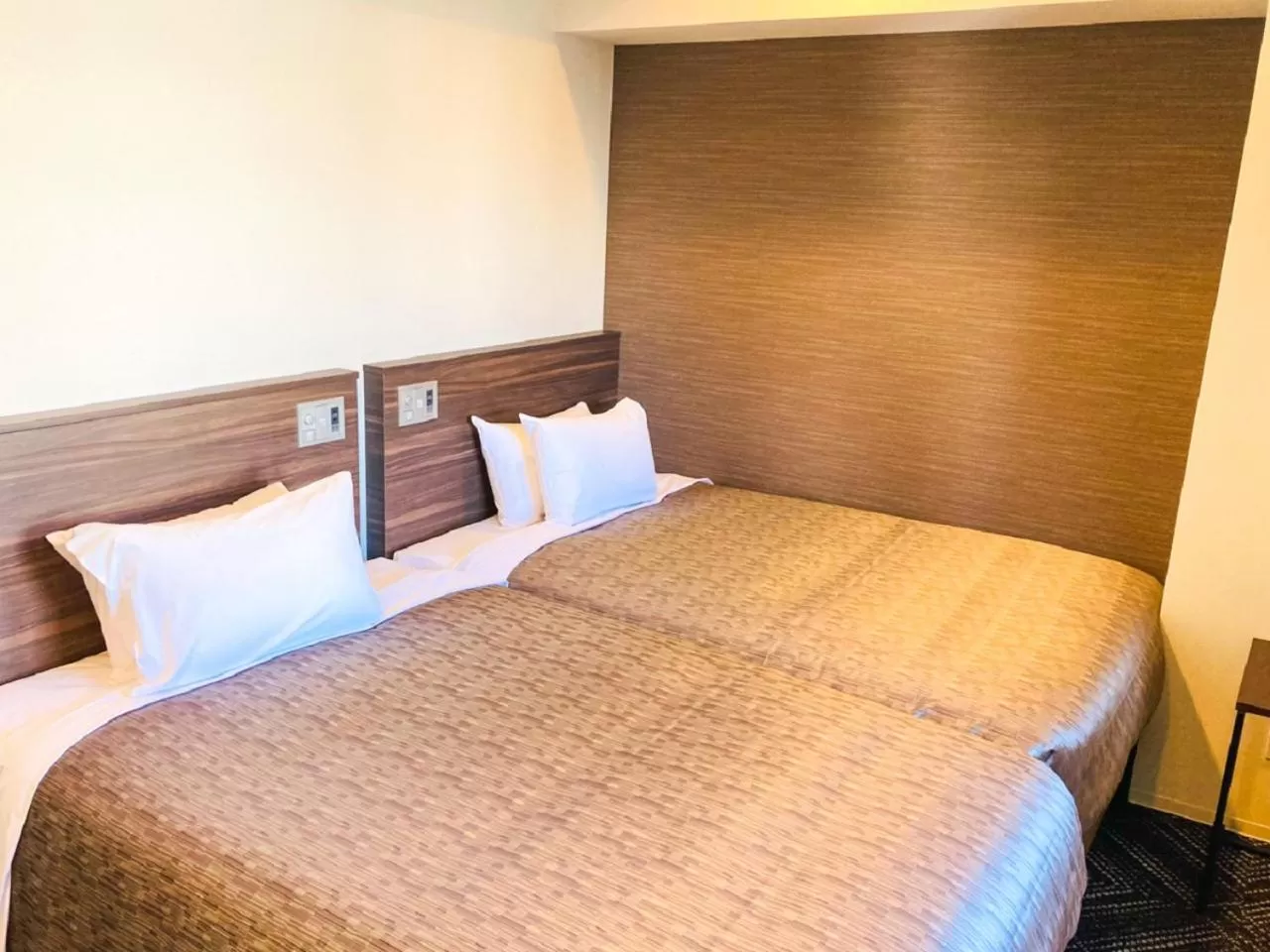 Bed in HOTEL LiVEMAX Sendai Hirosedori