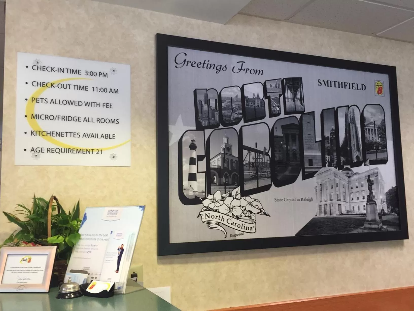 Property logo or sign in Super 8 by Wyndham Smithfield-Selma