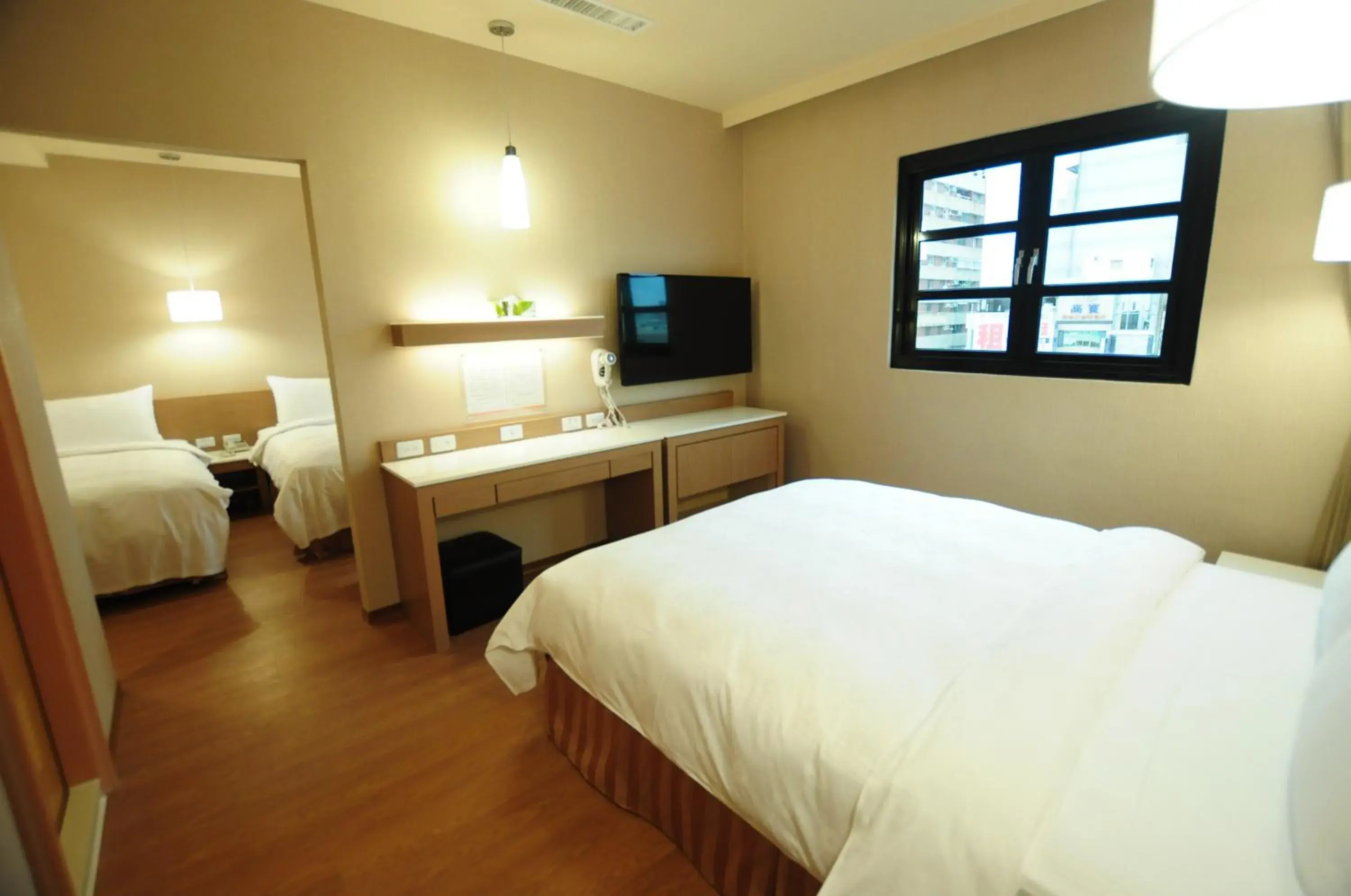 Photo of the whole room, Bed in Kindness Hotel - Kaohsiung Main Station