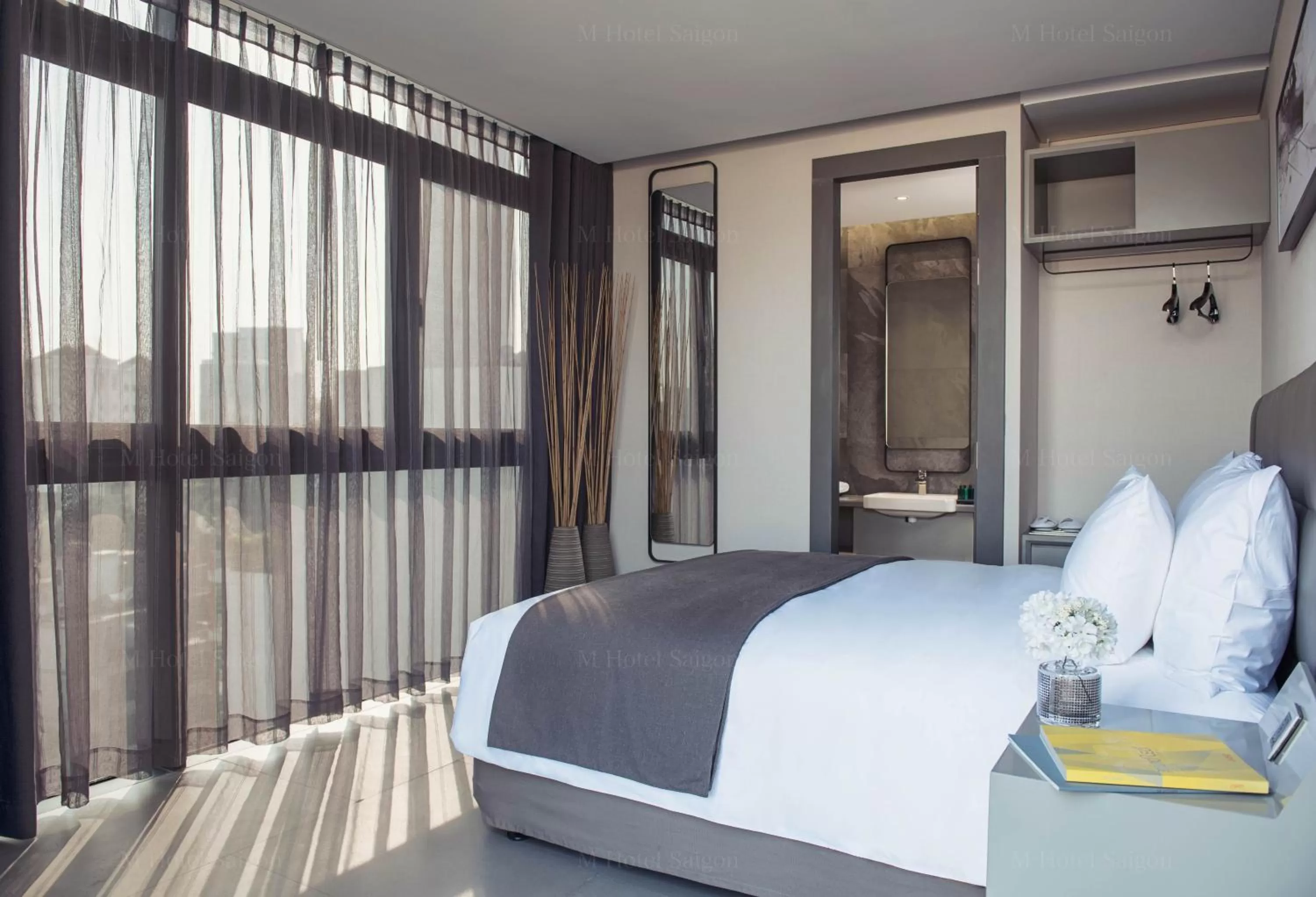 Bedroom, Bed in M Hotel Saigon