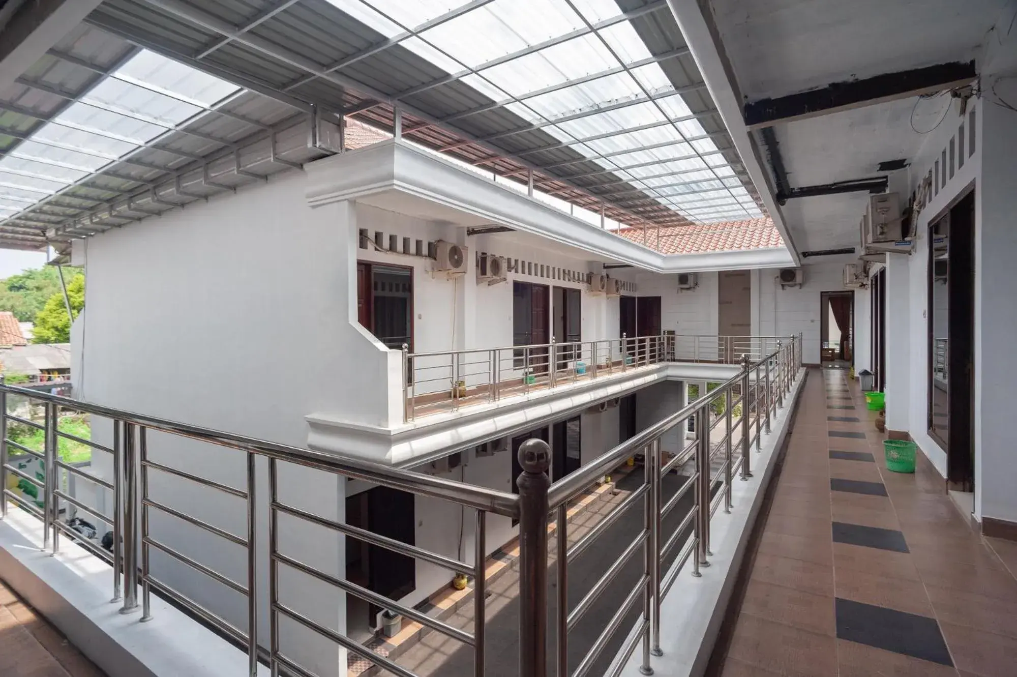 Property building, Balcony/Terrace in RedDoorz Syariah near Taman Air Mancur Bogor