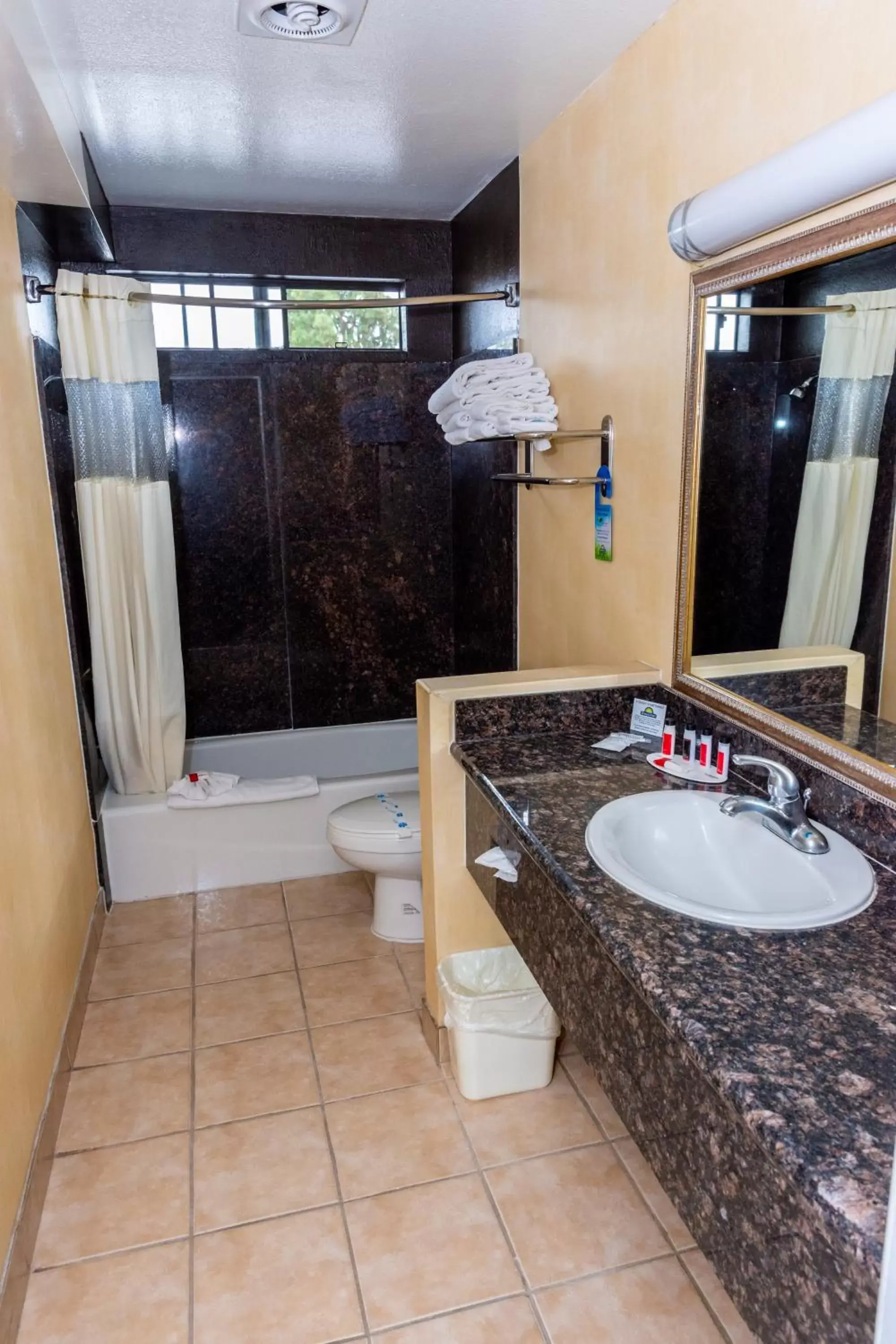 Shower, Bathroom in Days Inn & Suites by Wyndham Artesia