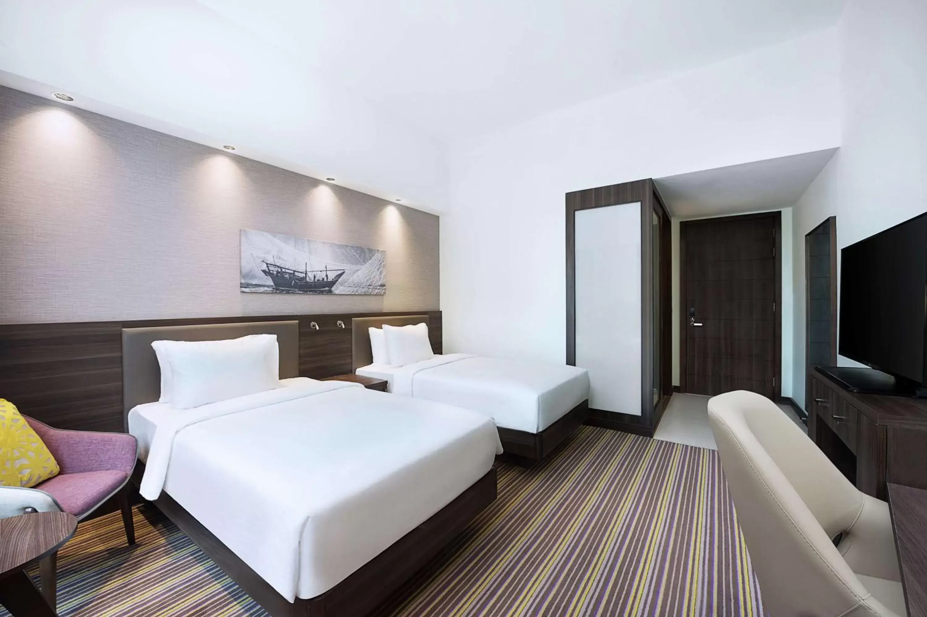 Bedroom, Bed in Hampton By Hilton Dubai Airport
