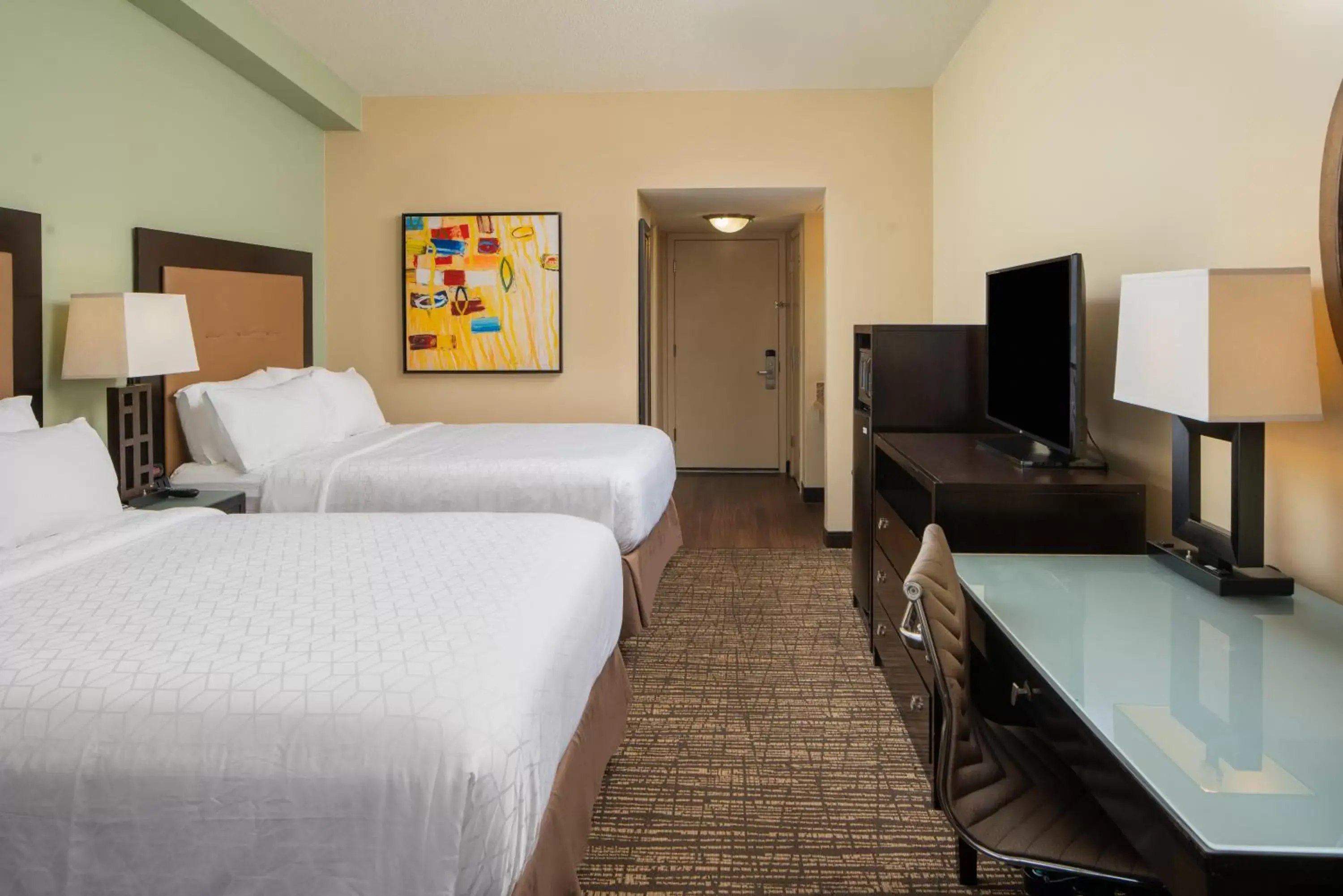 Photo of the whole room, TV/Entertainment Center in Holiday Inn Resort Galveston - On The Beach, an IHG Hotel