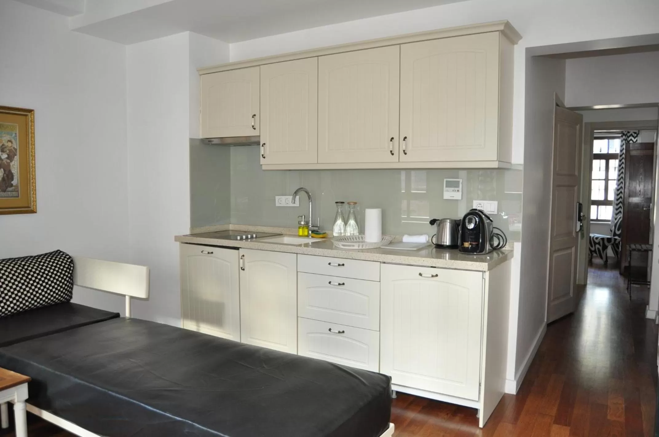 Kitchen or kitchenette in Villa Pera Suite Hotel