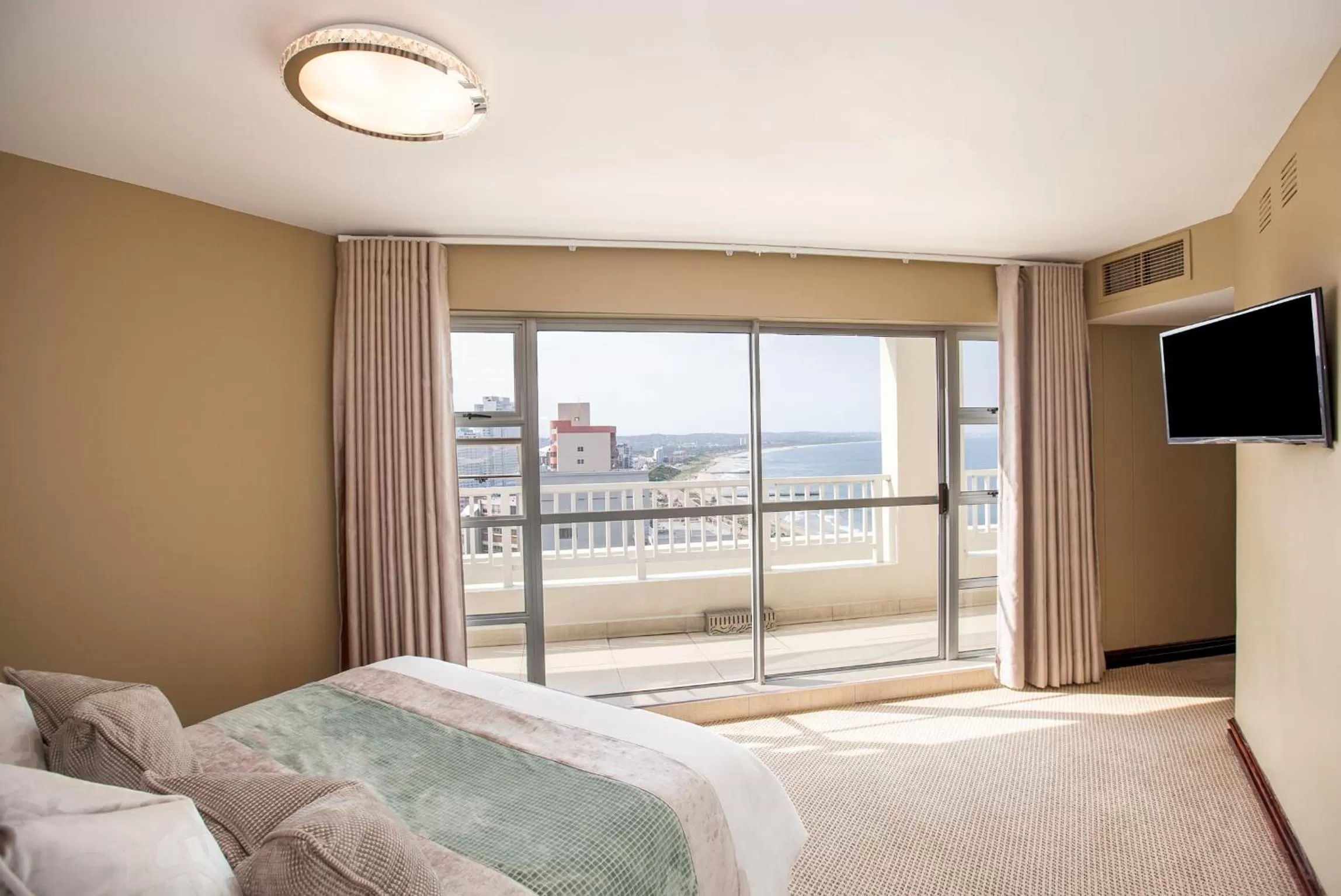 Bed in First Group The Palace All-Suite