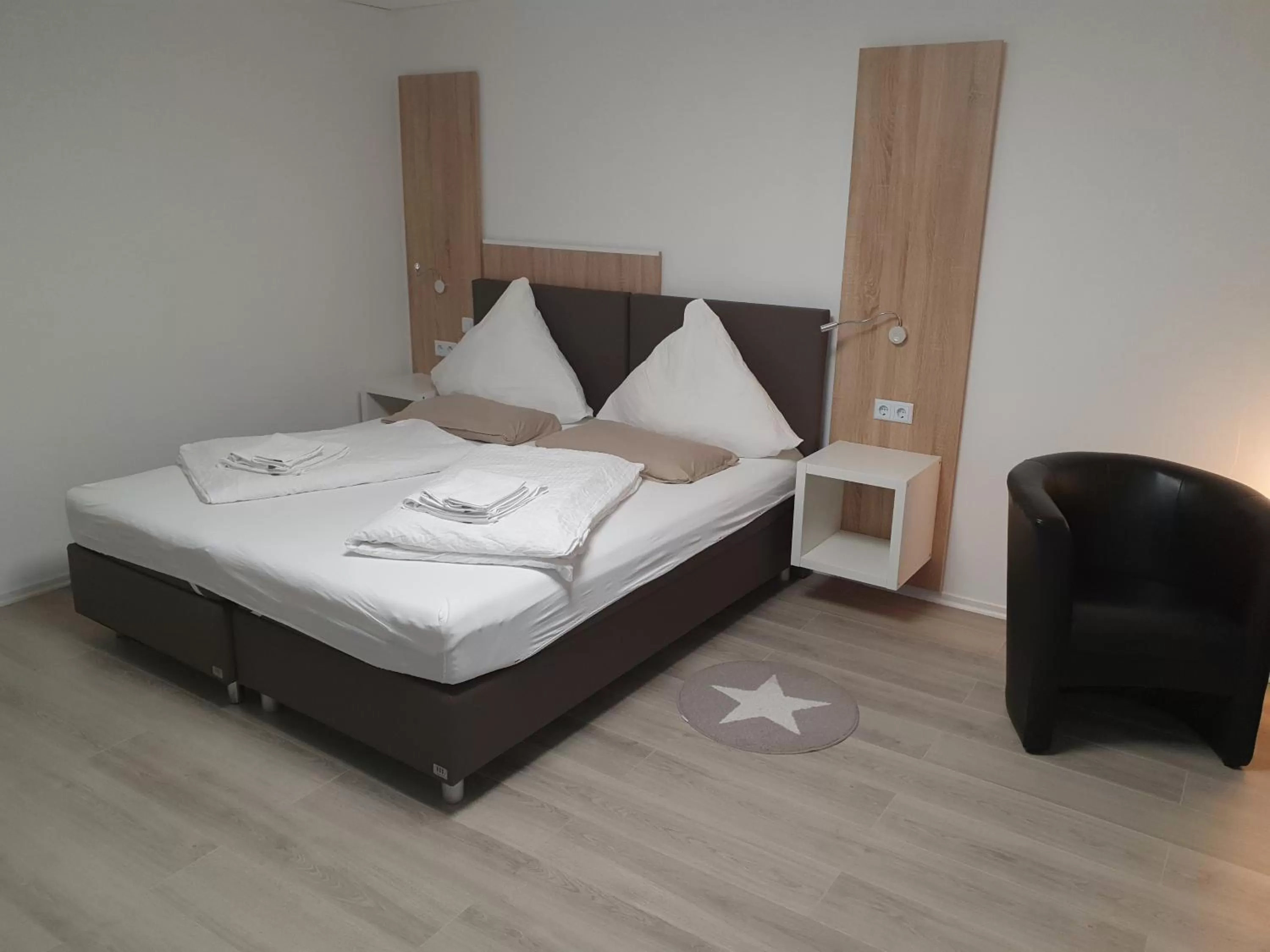 Bed in Hotel Exquisite