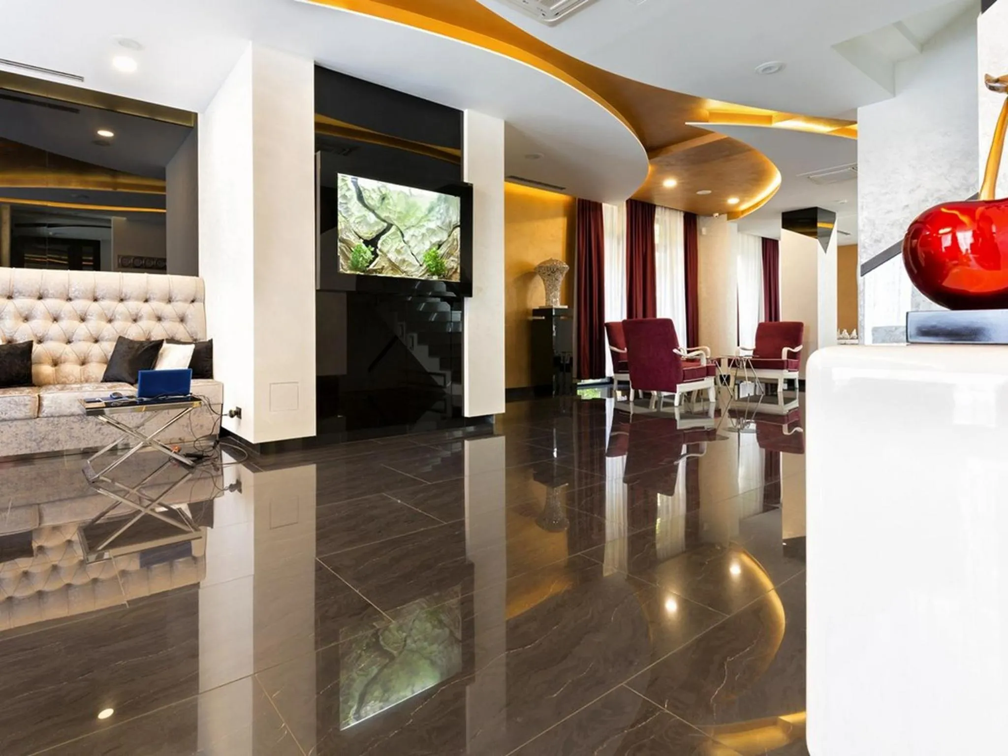 Communal lounge/ TV room in Nova City Garni Hotel Signature Collection