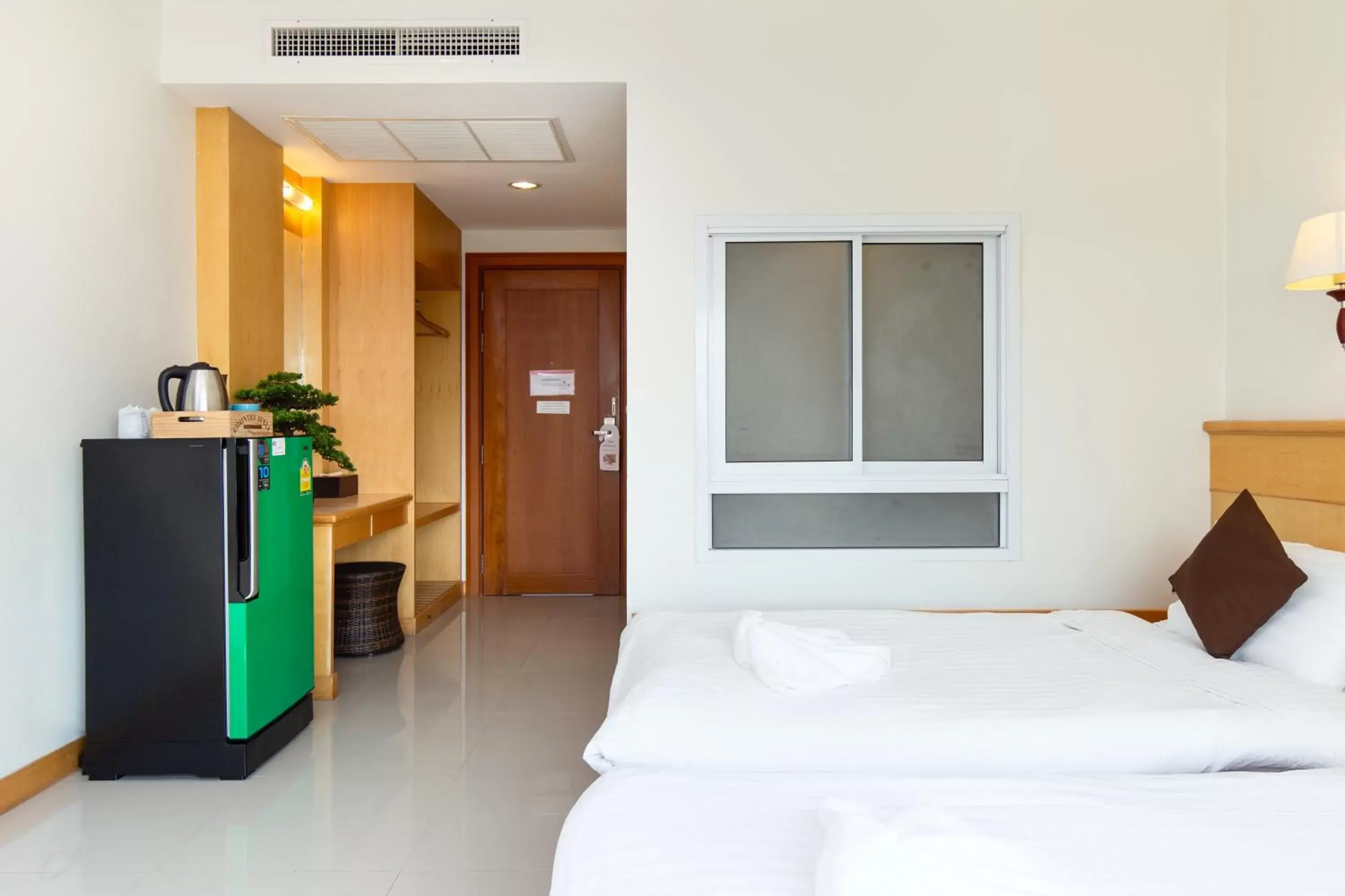 Bed in Kanchanaburi City Hotel - SHA Extra Plus