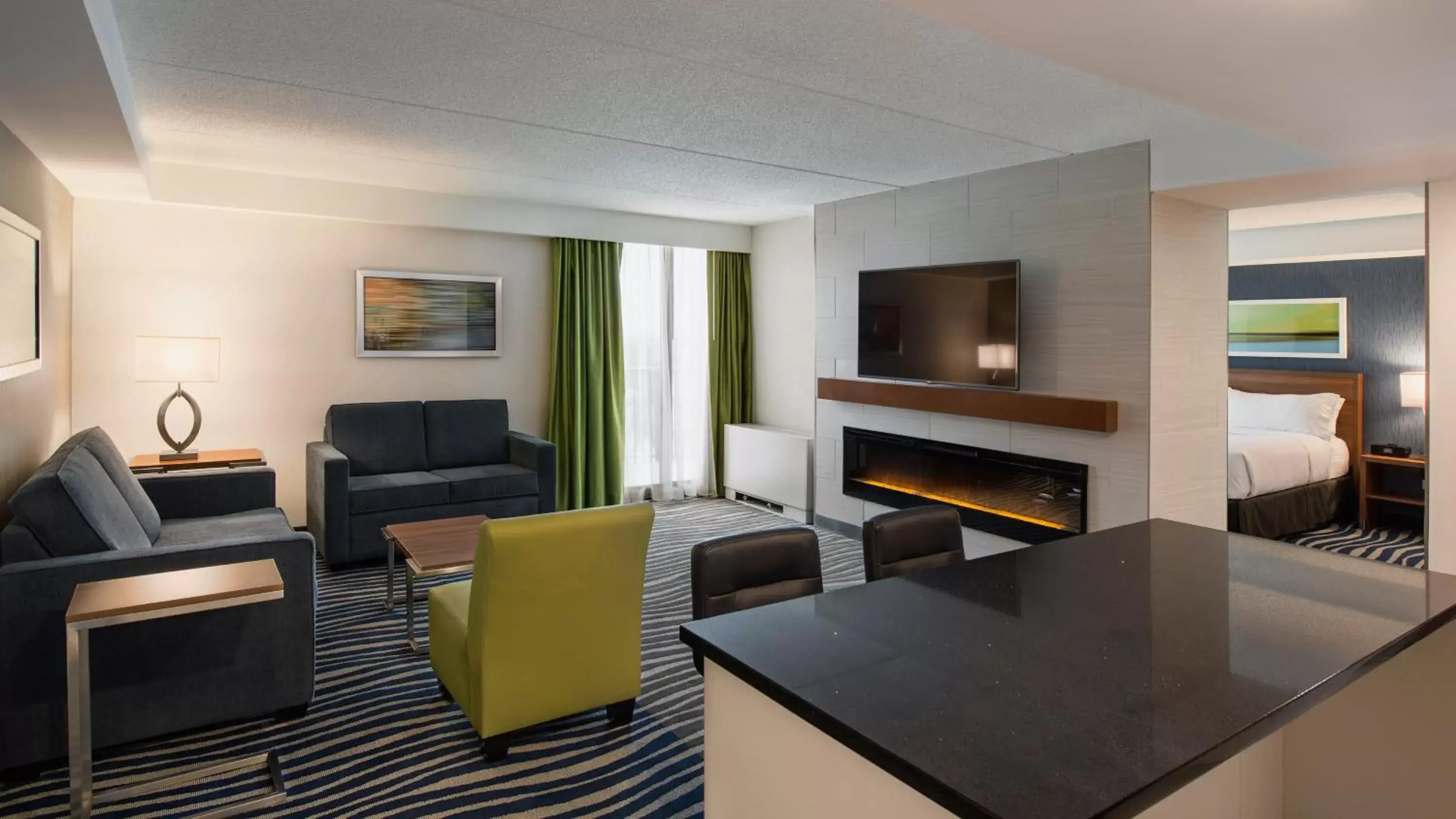Photo of the whole room, Seating Area in Holiday Inn Winnipeg - Airport West, an IHG Hotel