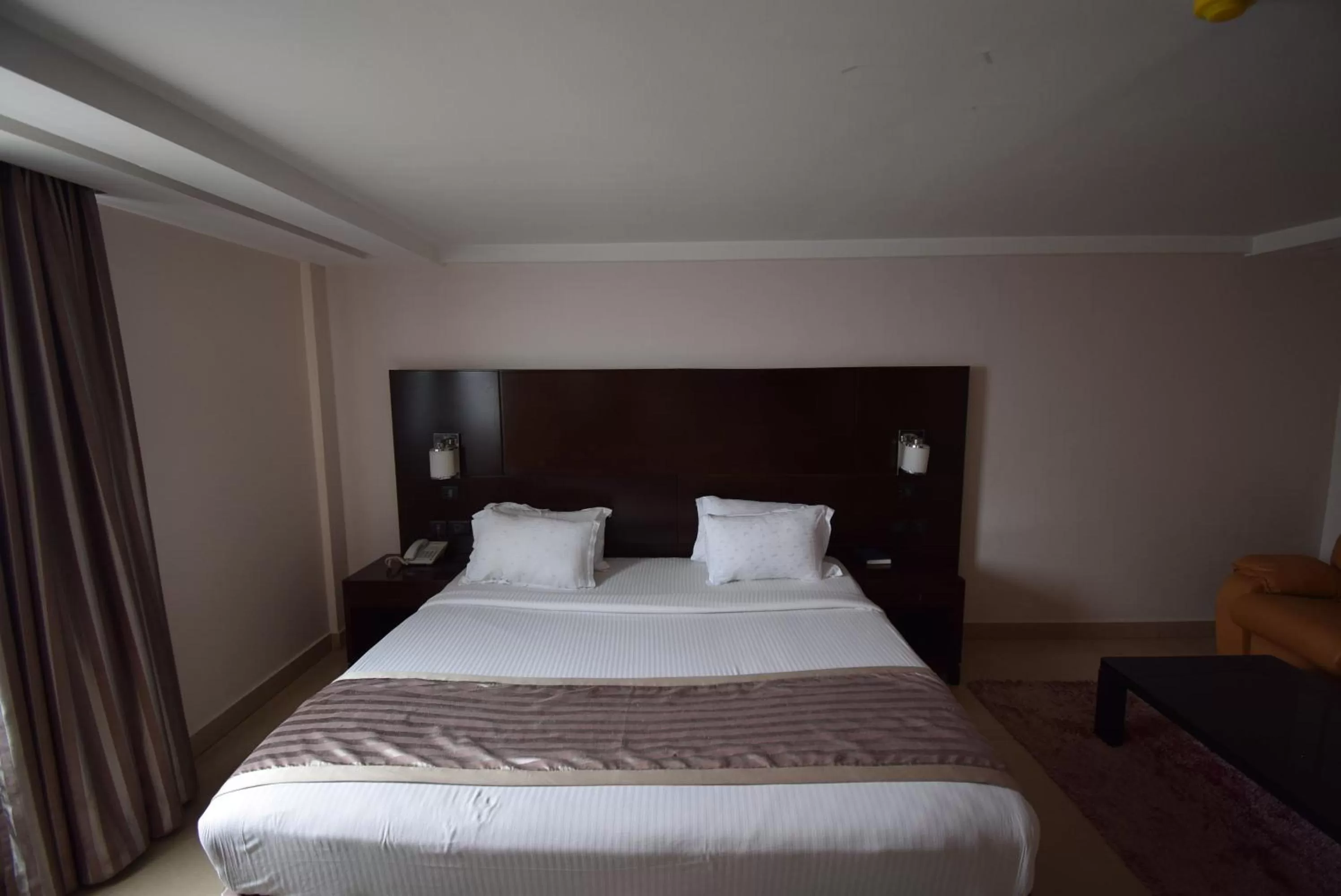 Bed in Noble House Hotel