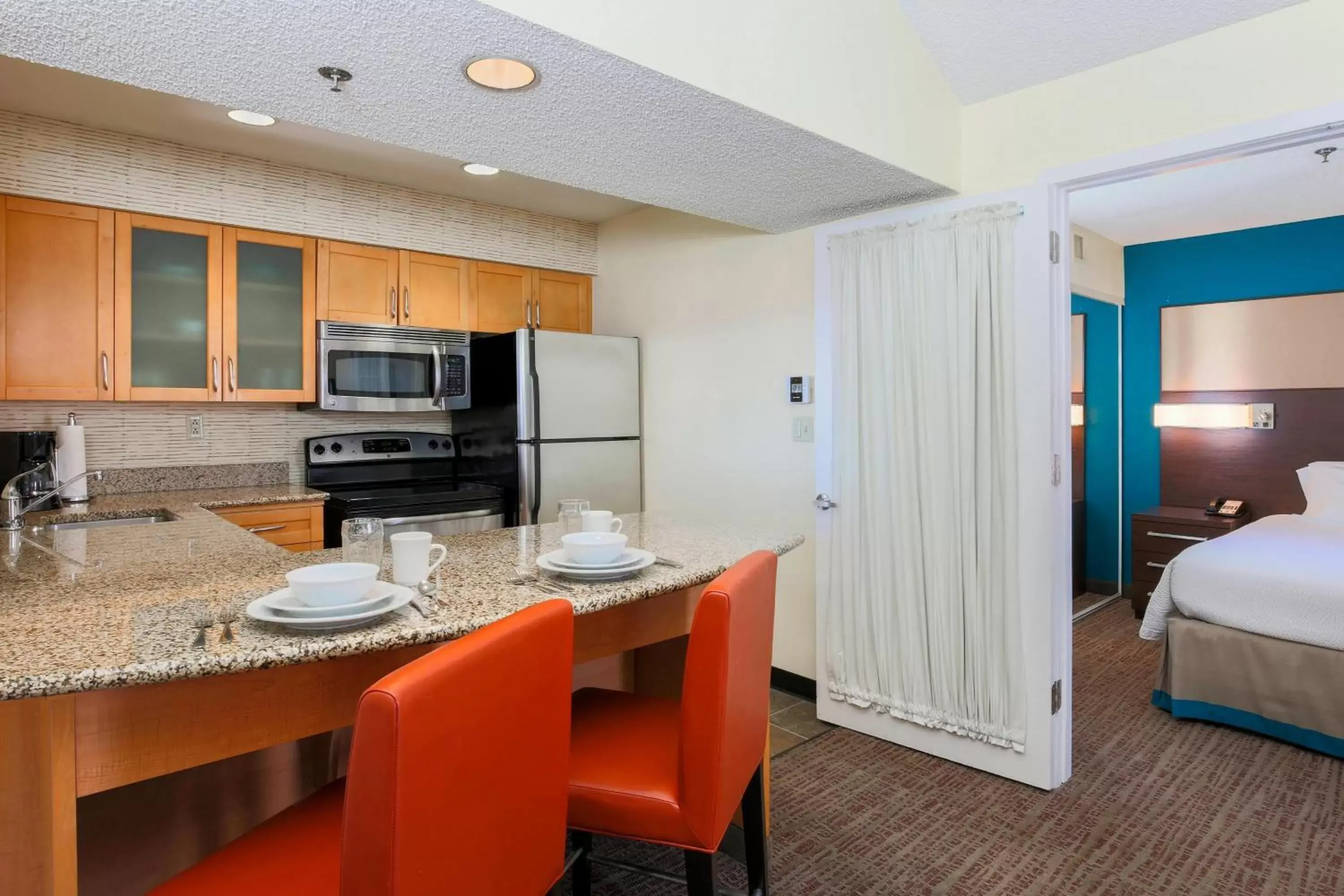 Bedroom, Kitchen/Kitchenette in Residence Inn Bakersfield