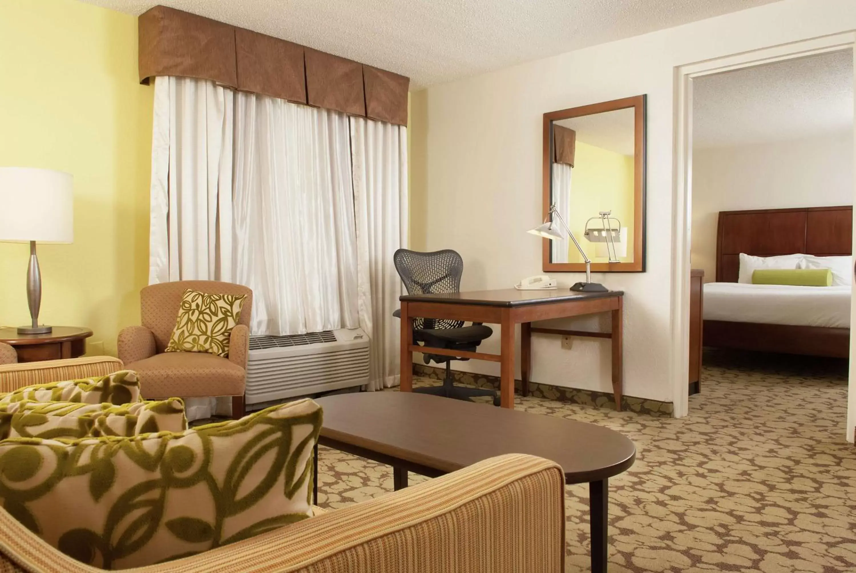 Bedroom, Seating Area in Hilton Garden Inn Orlando Airport