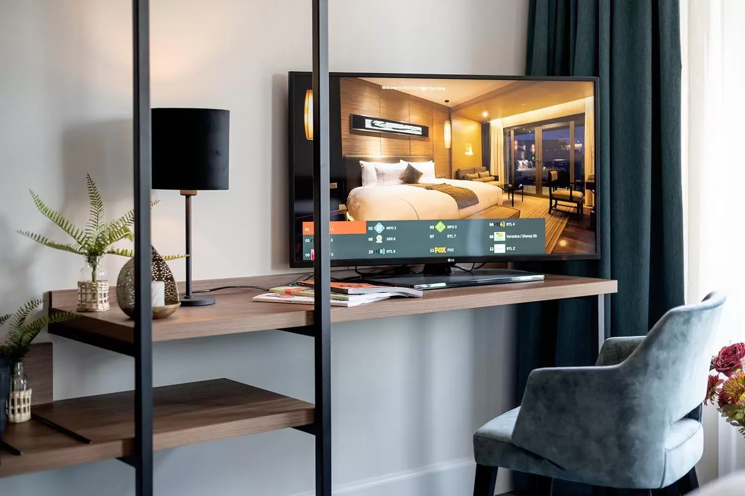 TV and multimedia, TV/Entertainment Center in Boutique Hotel First City