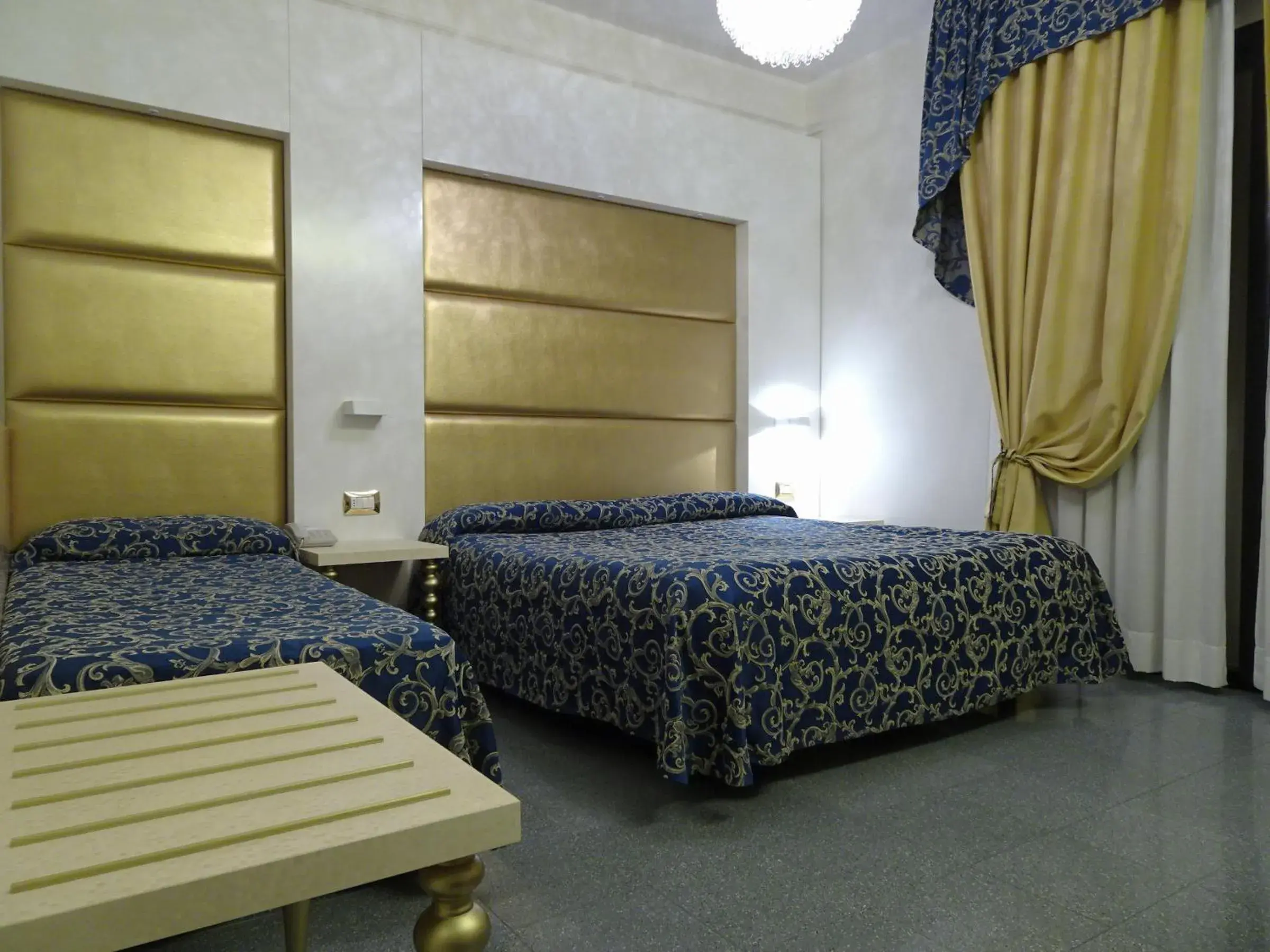 Bed in Hotel Ambassador