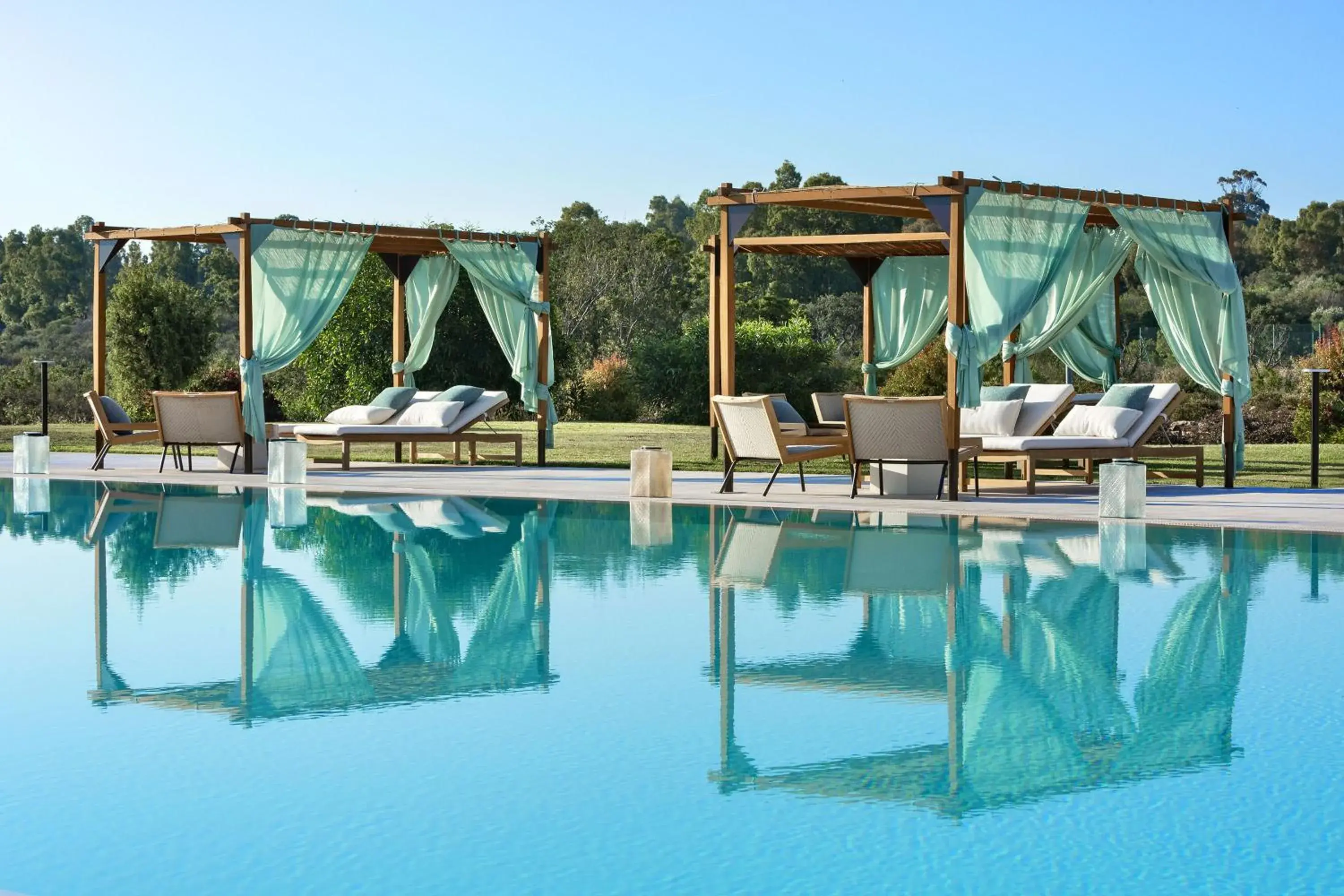 Swimming pool in Baglioni Resort Sardinia - The Leading Hotels of the World Swimming pool in Baglioni Resort Sardinia - The Leading Hotels of the World