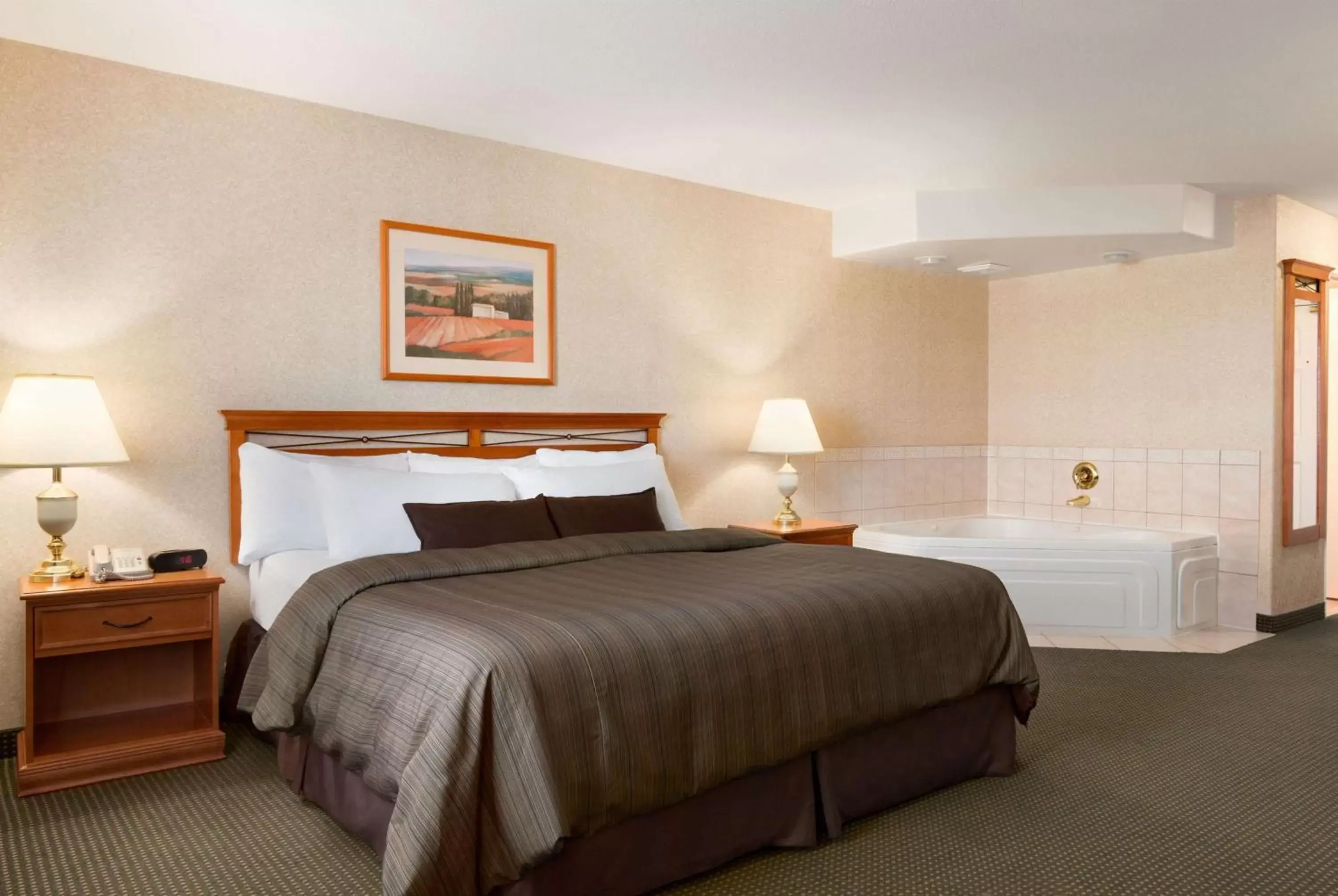 Photo of the whole room, Bed in Days Inn by Wyndham Saskatoon