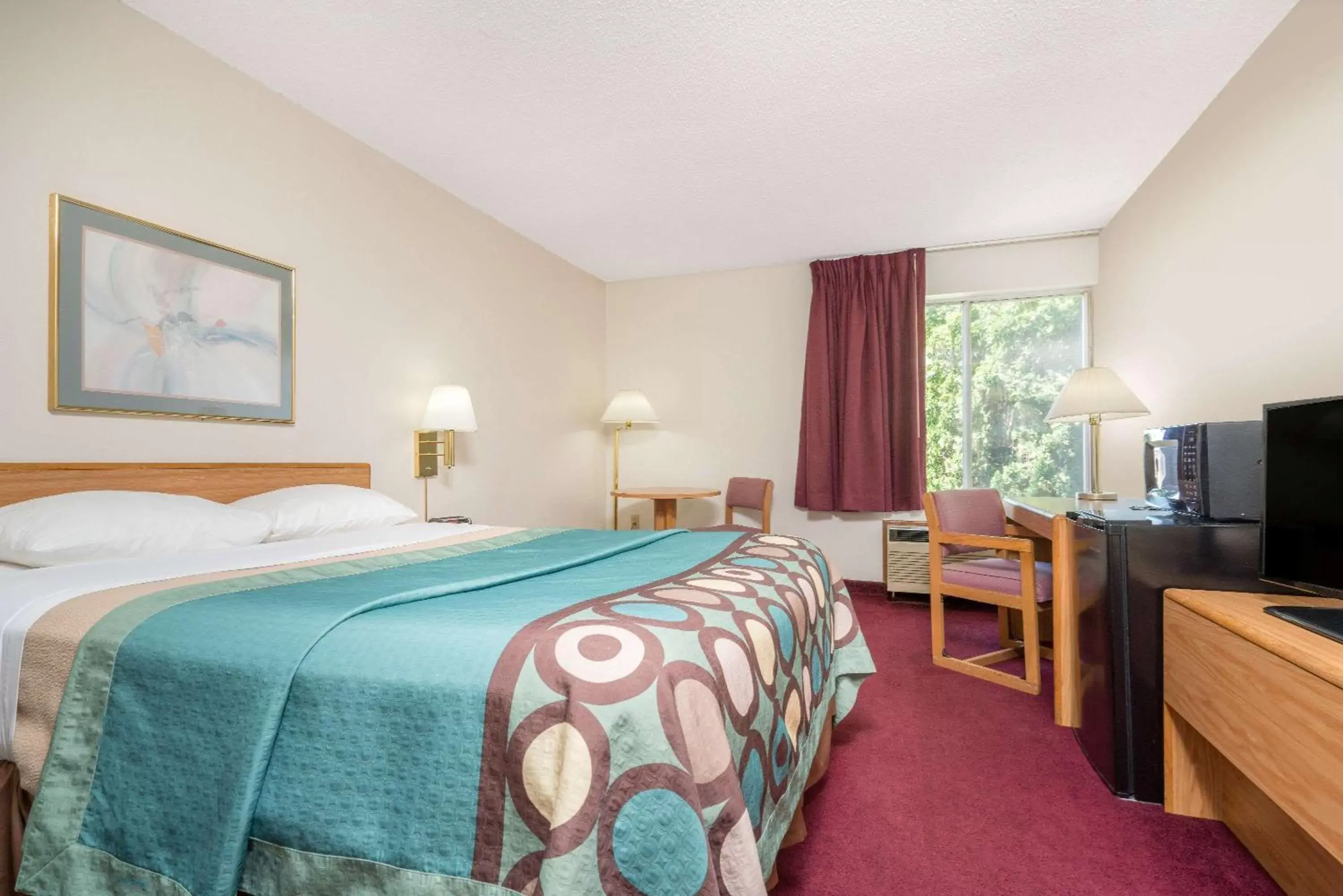 Photo of the whole room, Bed in Super 8 by Wyndham Menomonie WI