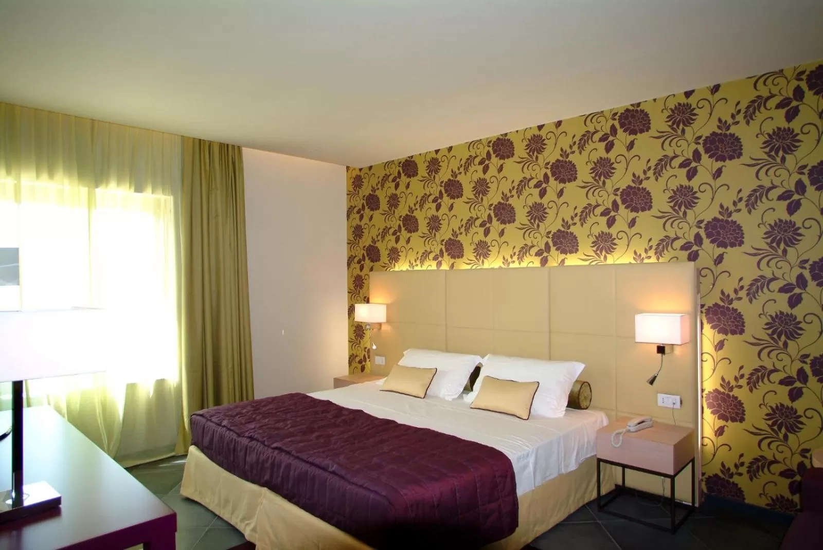 Bed in El Homs Palace Hotel