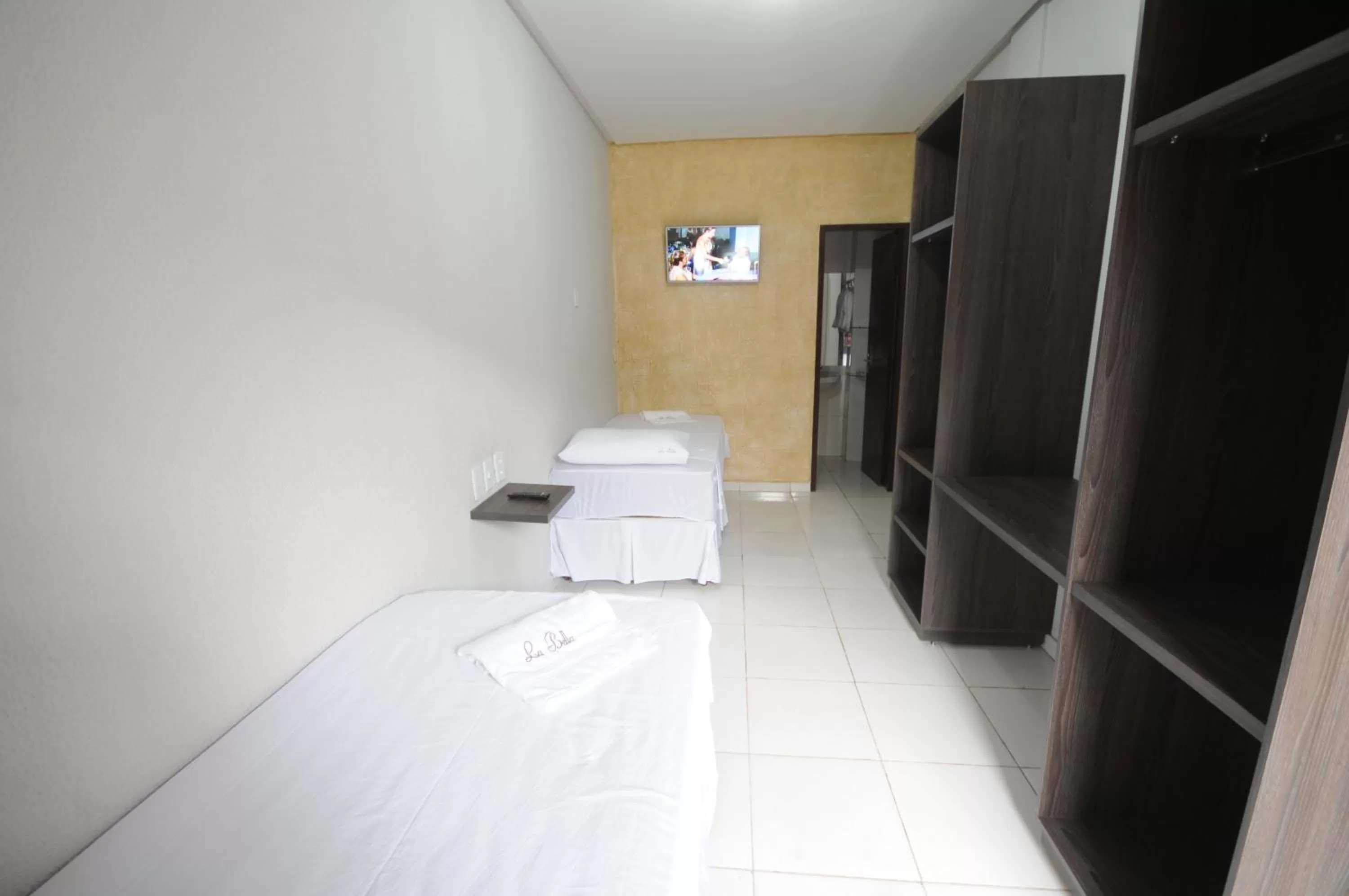 Bed in La Bella Hotel