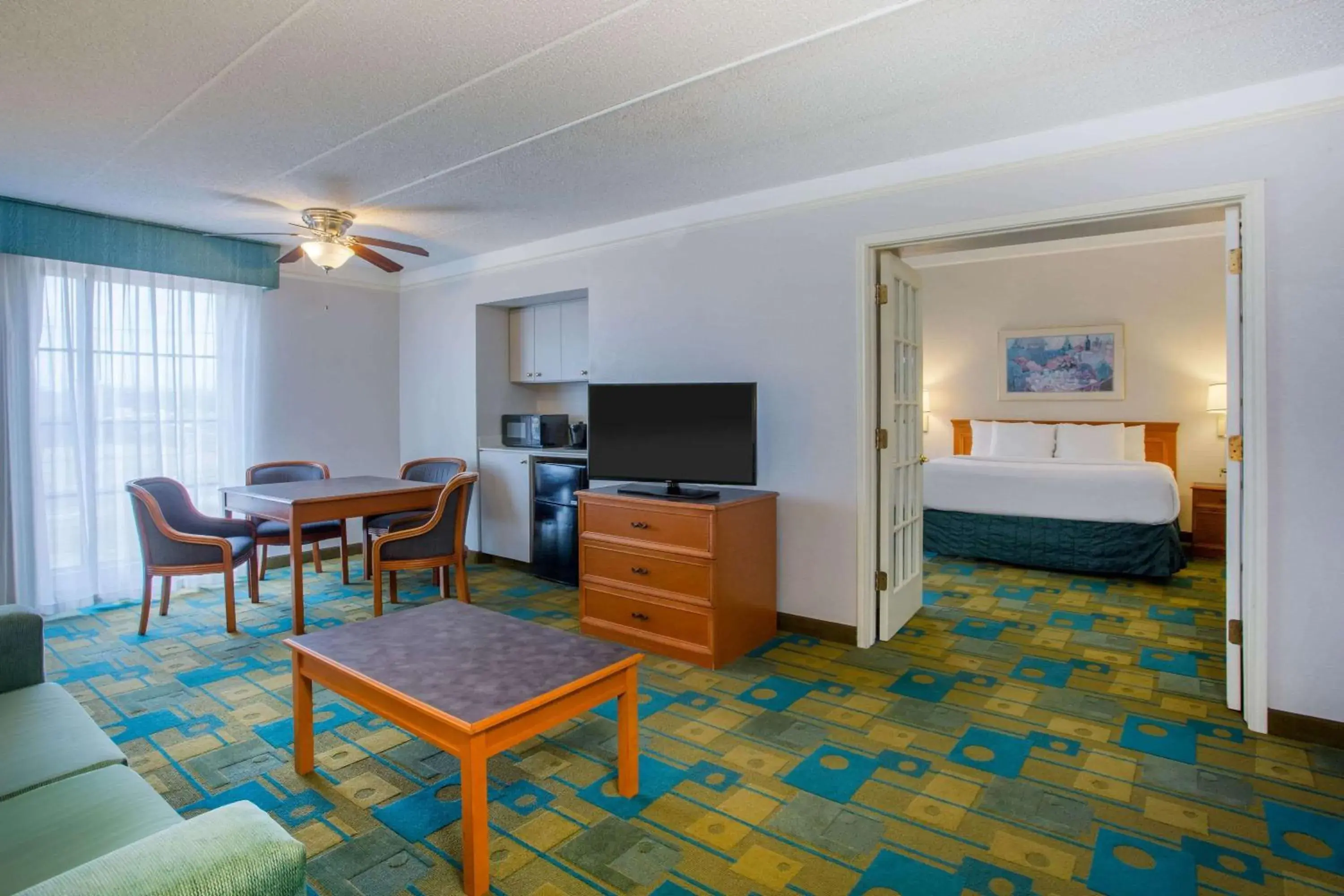 Photo of the whole room, TV/Entertainment Center in La Quinta Inn by Wyndham Norfolk Virginia Beach