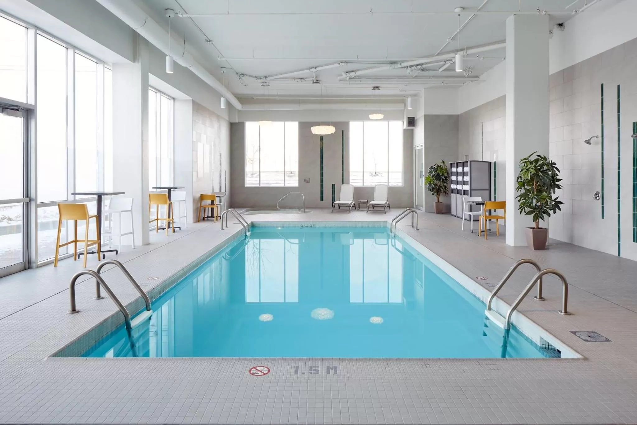 Swimming pool in Holiday Inn & Suites Montreal Airport by IHG