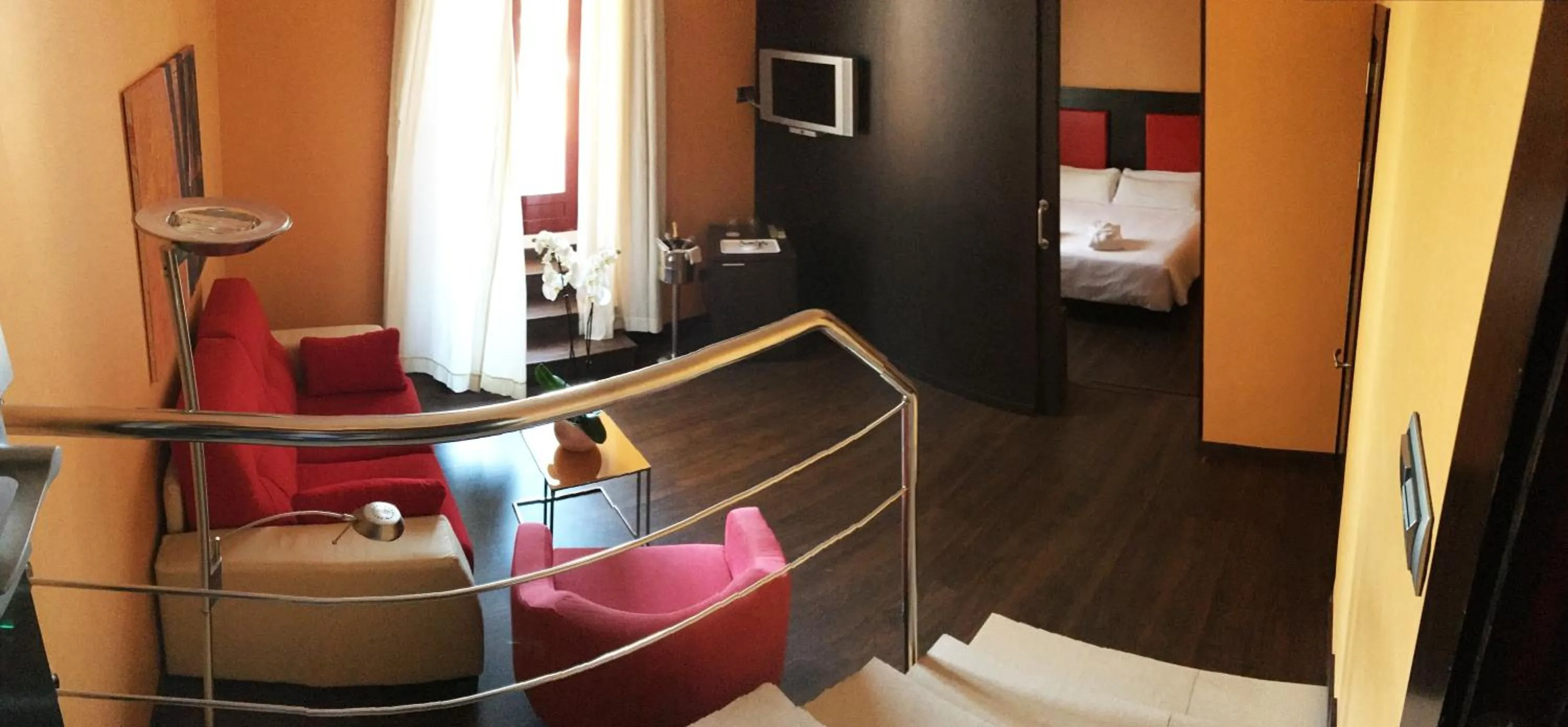 Communal lounge/ TV room in The Cookbook Gastro Boutique Hotel & SPA