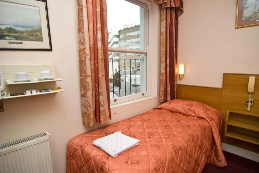 Bed in Alexandra Hotel