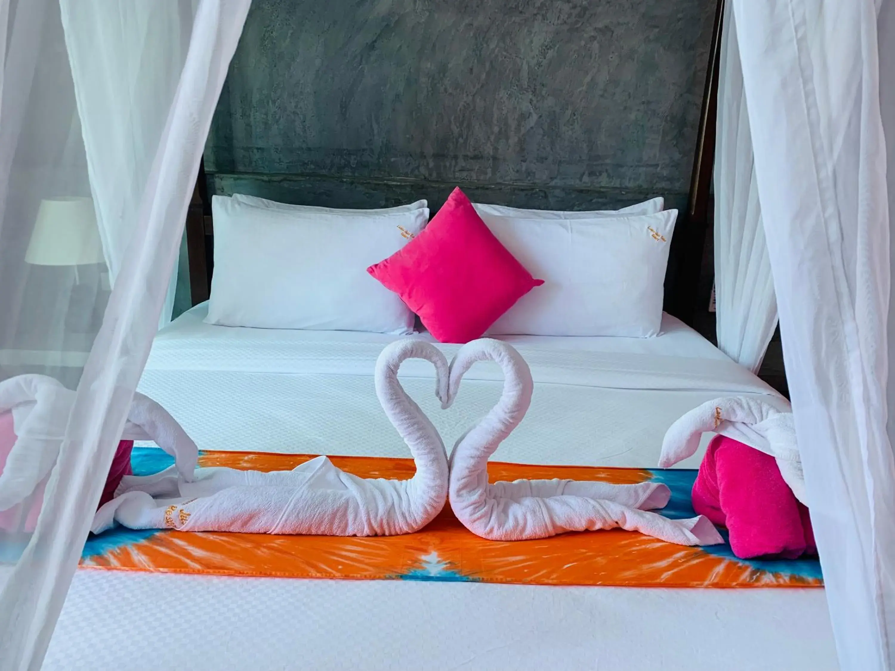 Bed in Pinky Bungalow Resort - SHA Extra Plus