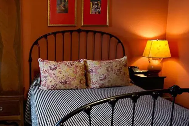 Bed, Seating Area in Hotel Boheme