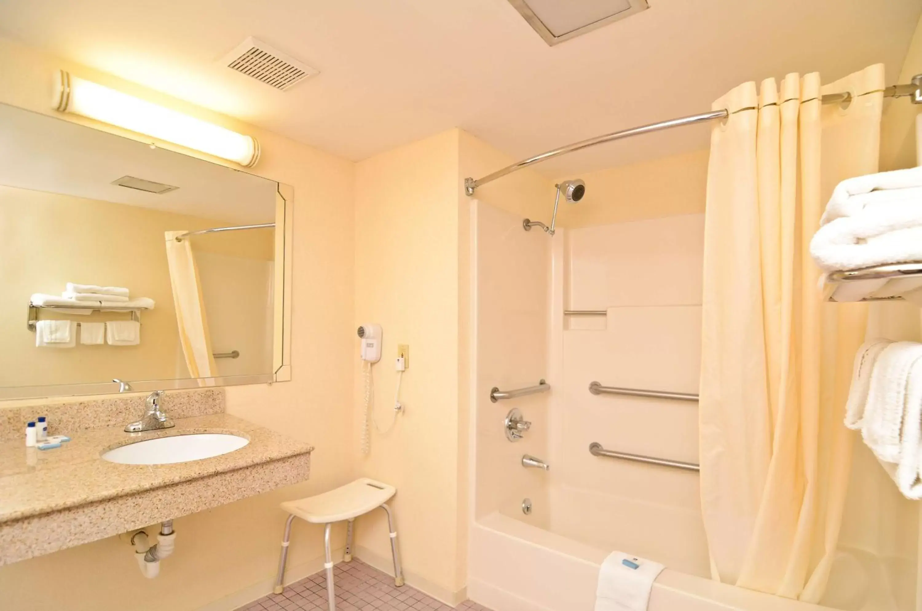 Photo of the whole room, Bathroom in MHO INN and SUITES
