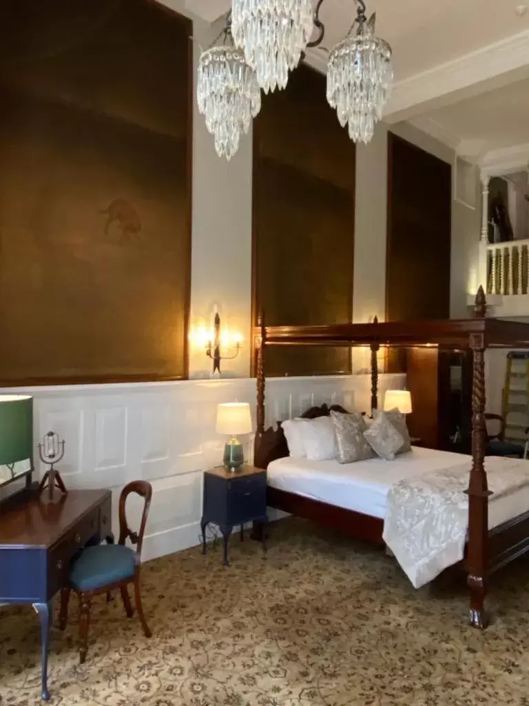 Bed in Langtry Manor Hotel