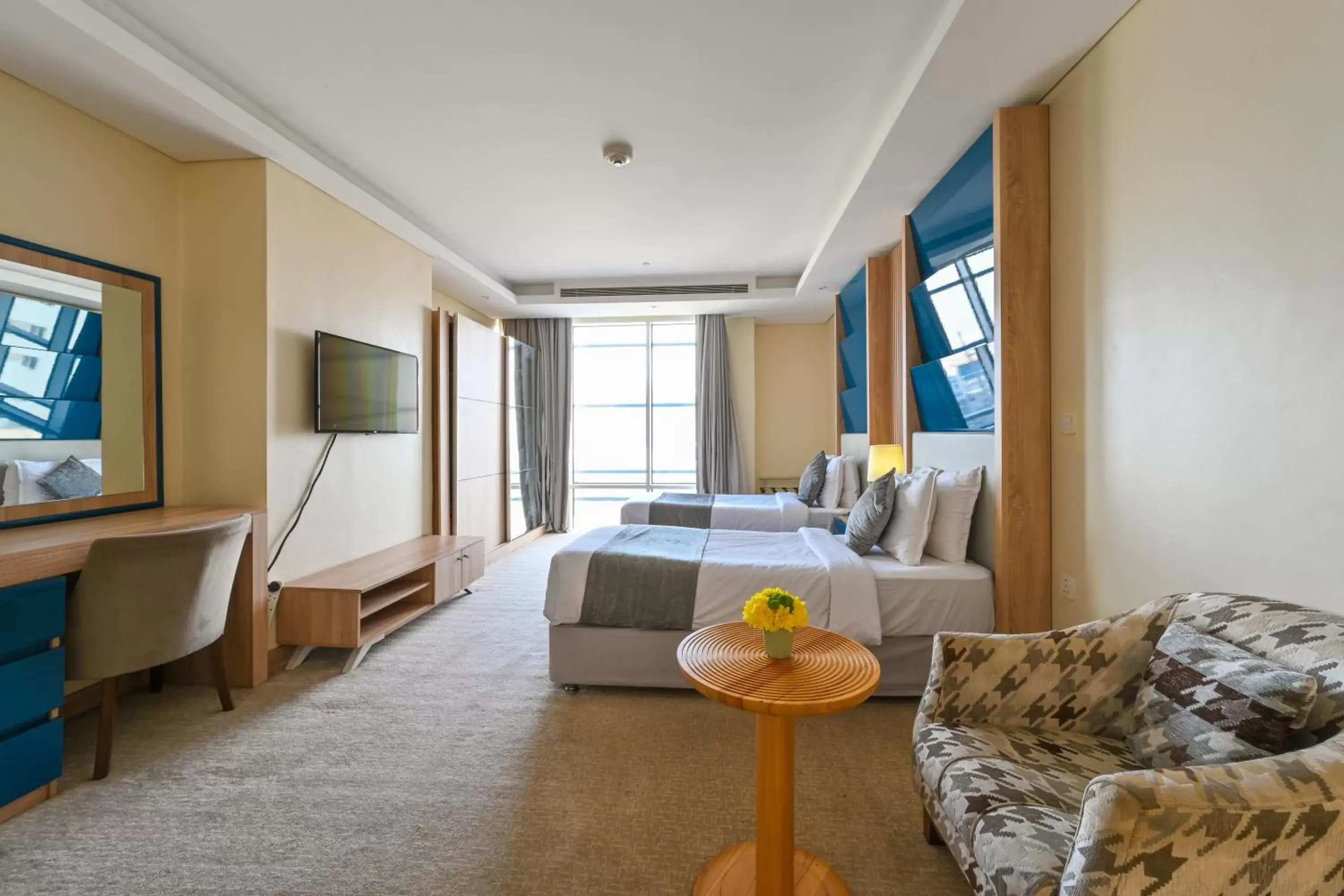 Bed in Al Mansour Suites Hotel
