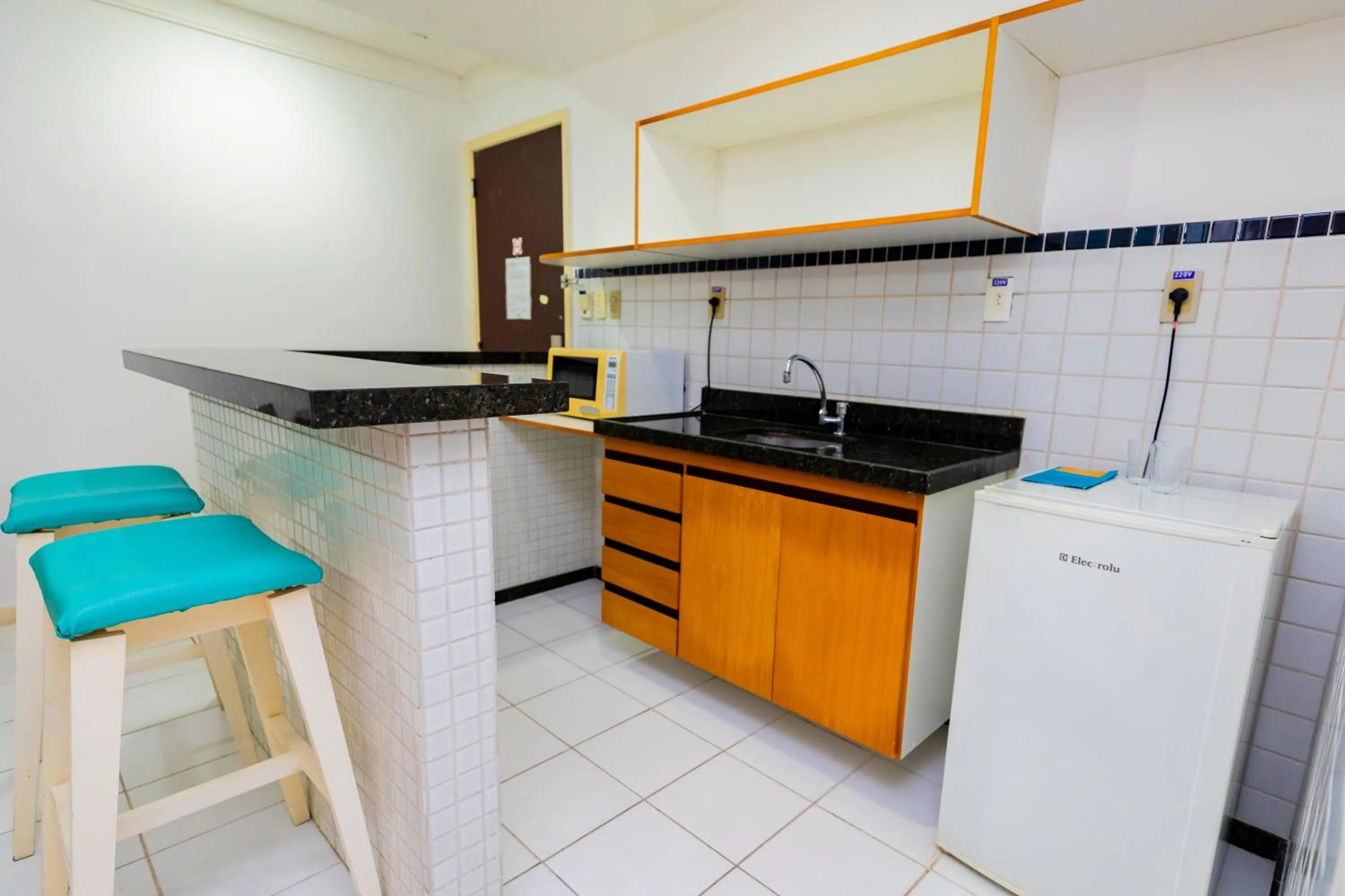 Kitchen or kitchenette in Hotel Ponta Negra Beach Natal