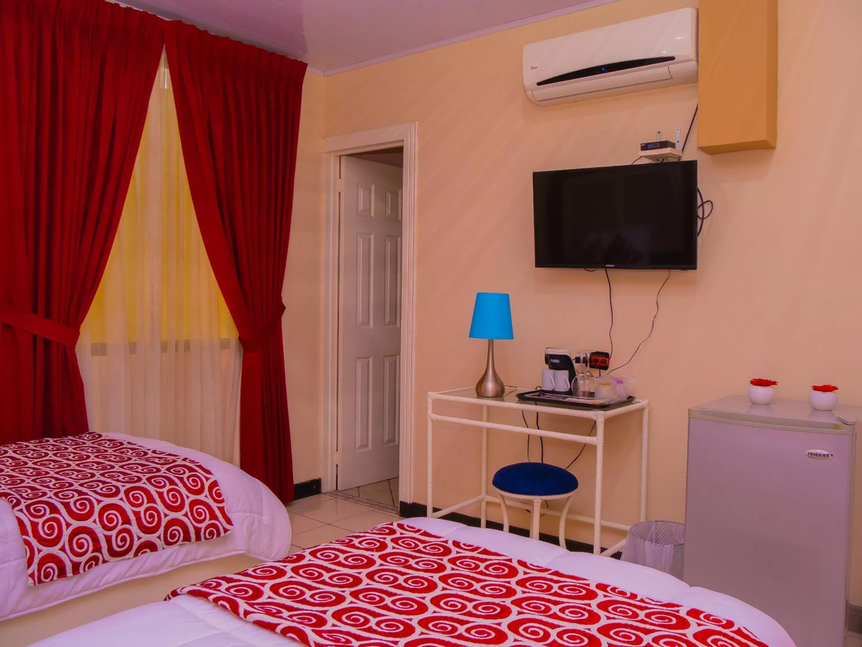 Bed in Hotel Bamboo Aeropuerto