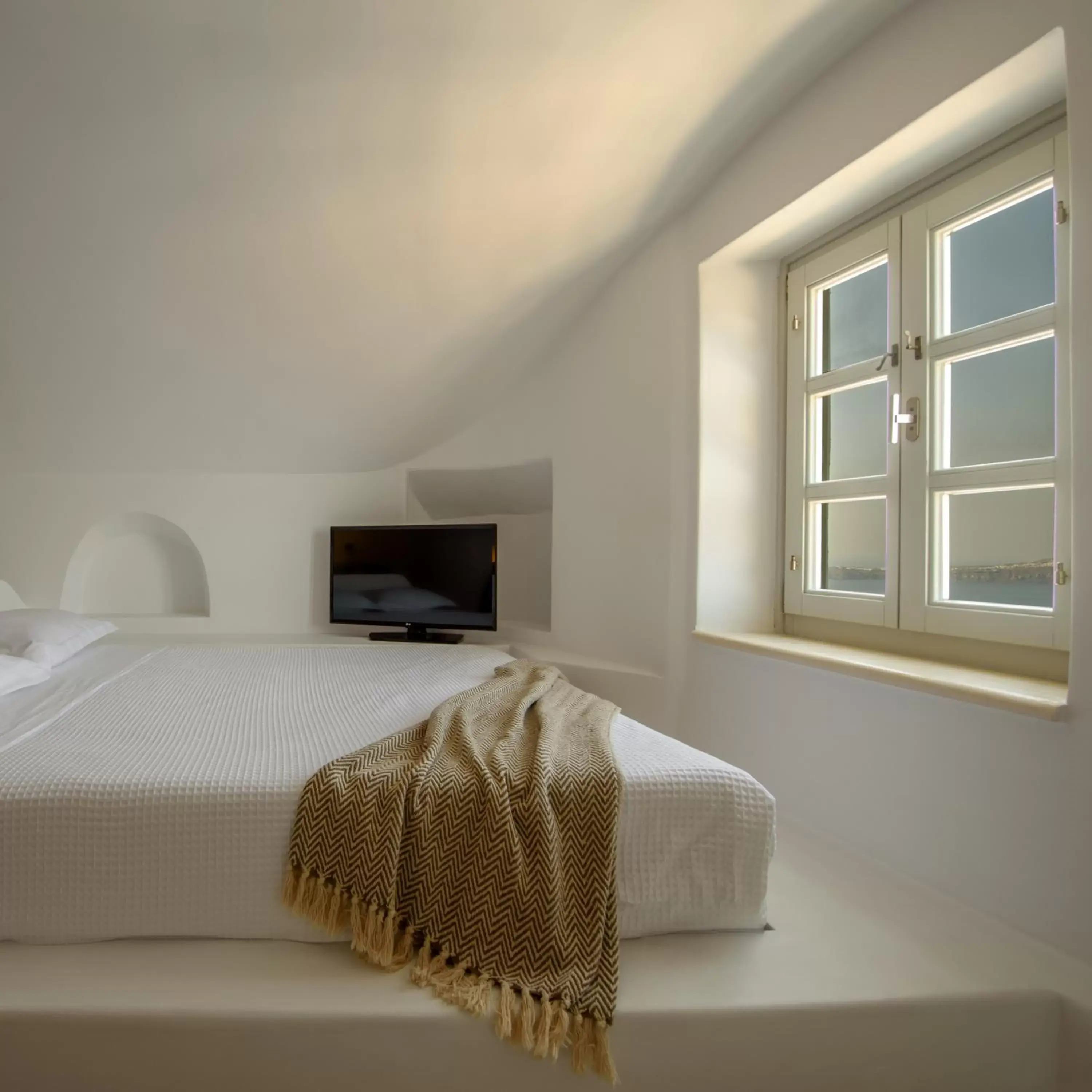 Bed in Nefeles Luxury Suites