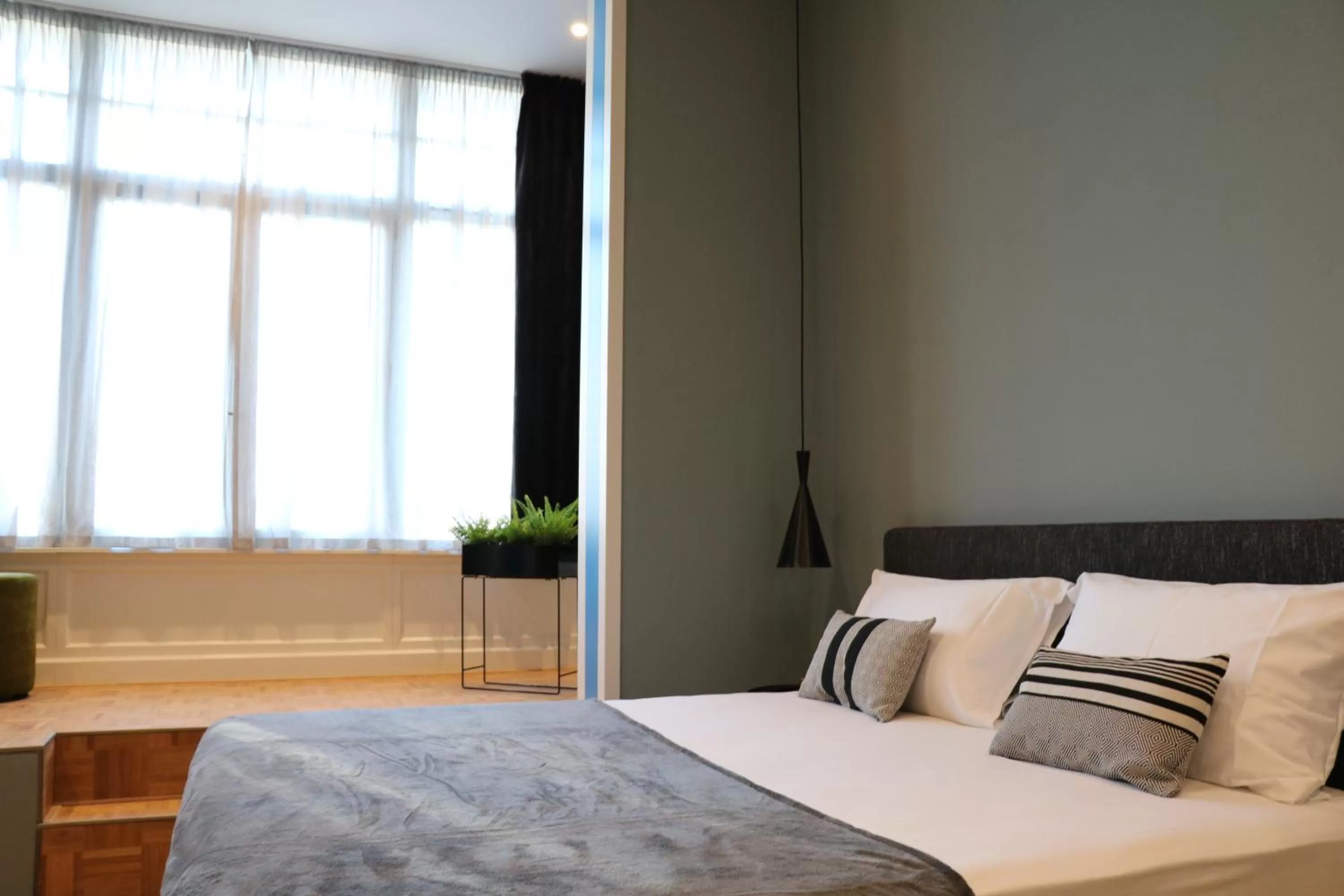 Bed in Quentin Zoo hotel