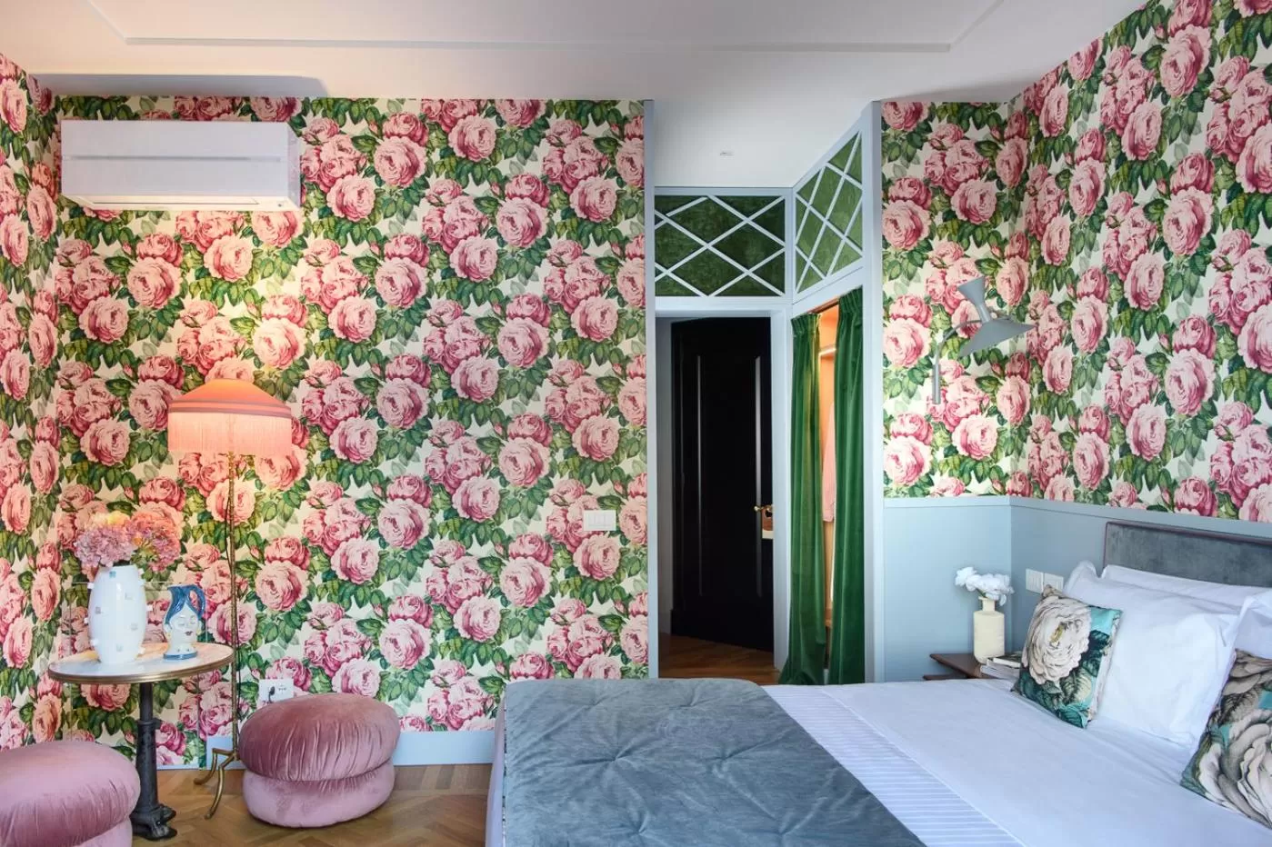 Bed in Velona's Jungle Luxury Suites