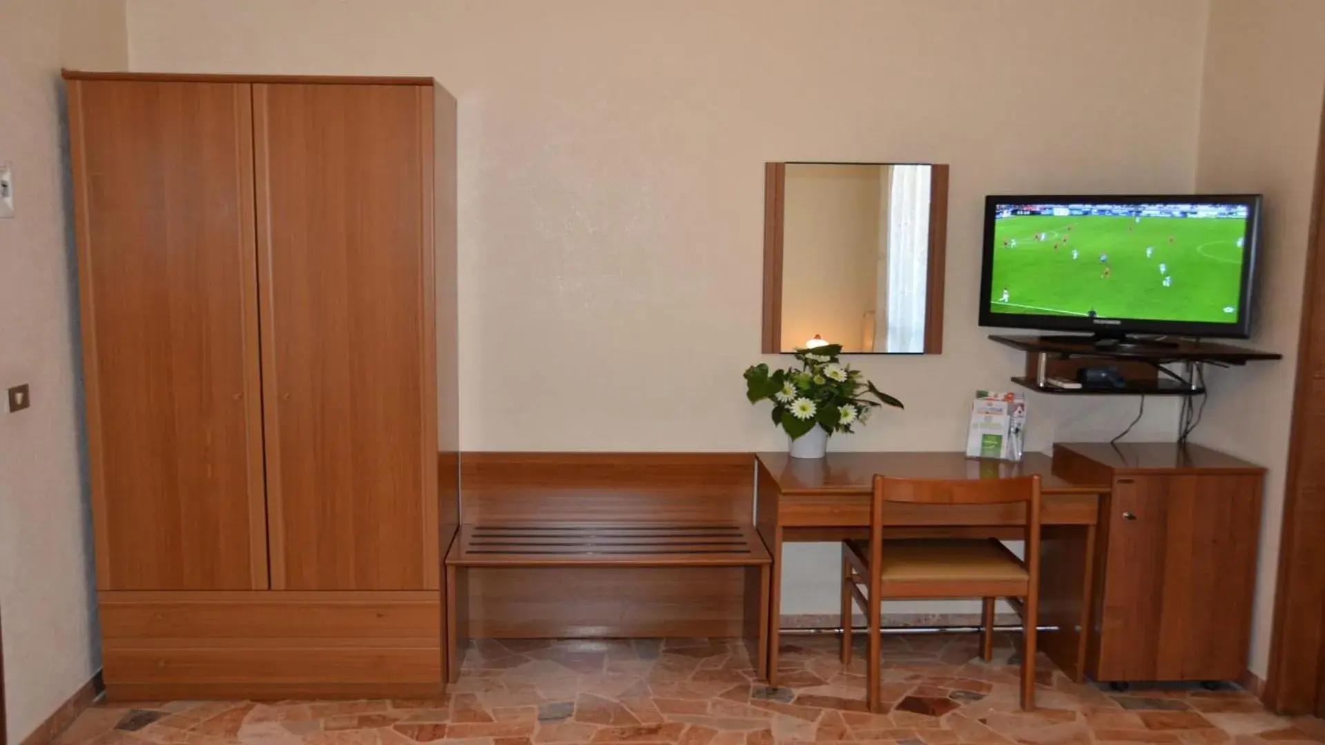 Bedroom, TV/Entertainment Center in Hotel A-14