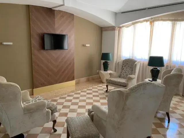 Communal lounge/ TV room, Seating Area in Relais La Fattoria