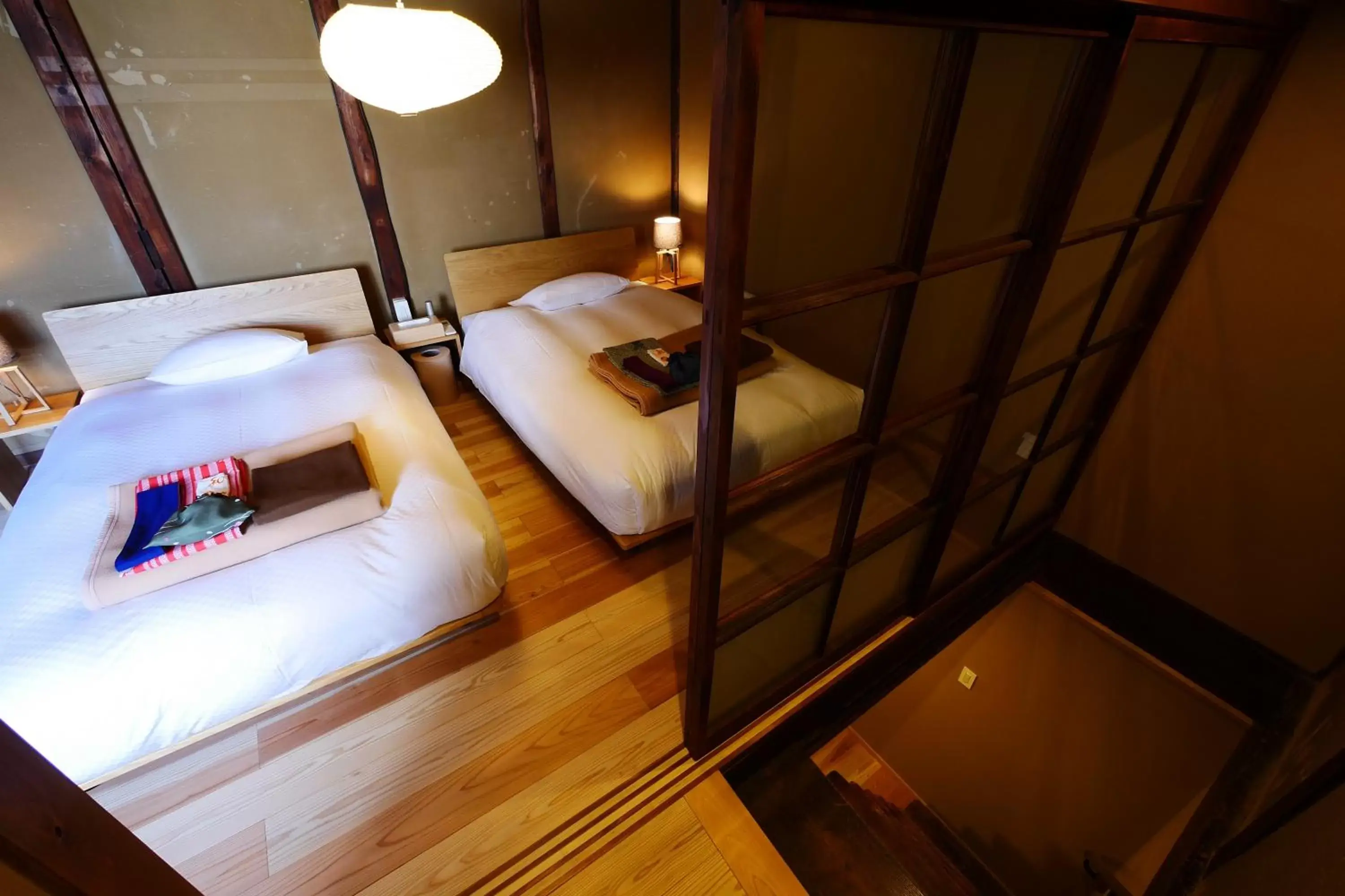 Bed in NIPPONIA HOTEL NARA NARAMACHI