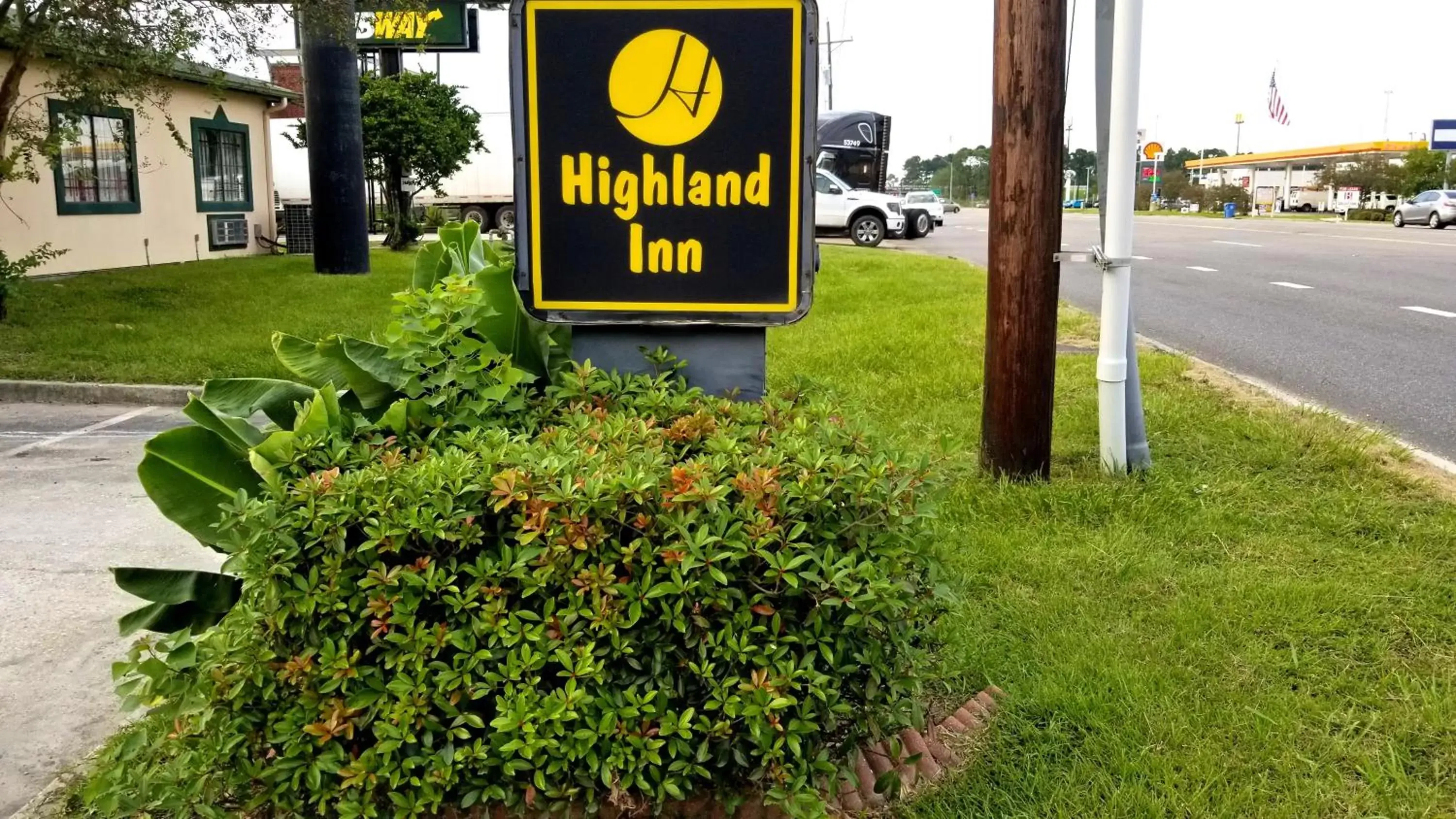 Property logo or sign in Highland Inn Denham Springs Baton Rouge East