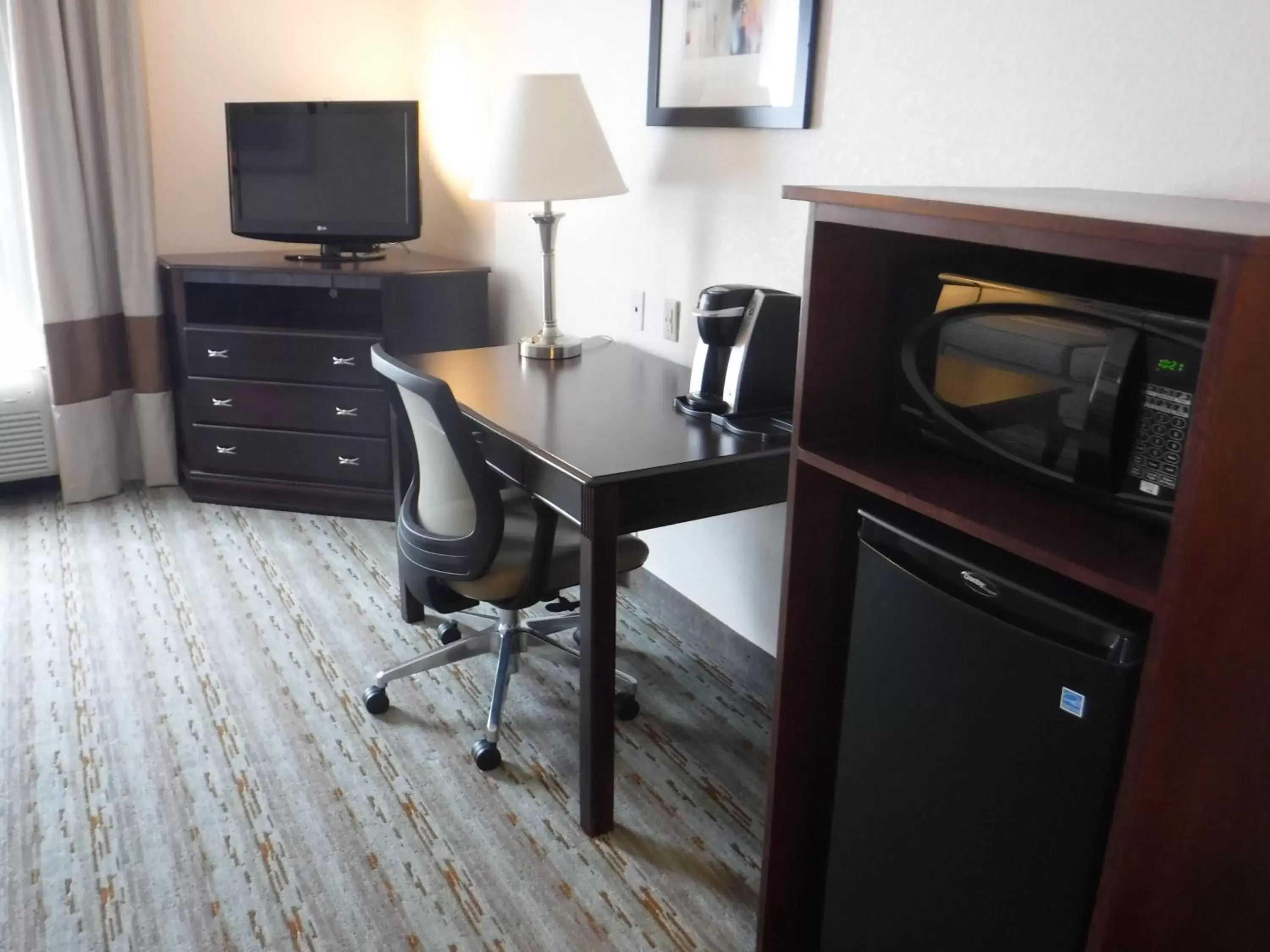 Photo of the whole room, TV/Entertainment Center in Holiday Inn Express West Jefferson, an IHG Hotel