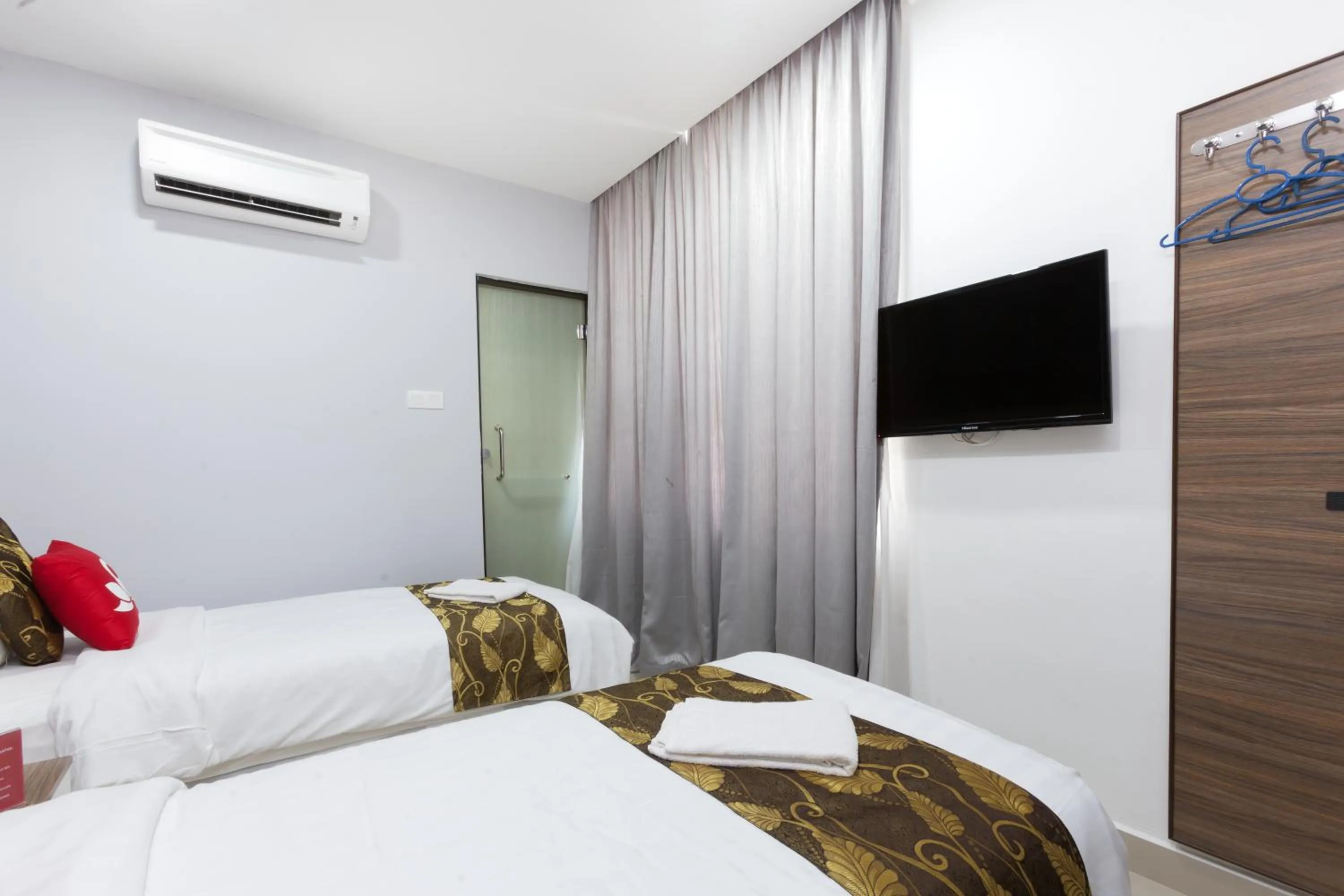 Bed in D'Metro Hotel