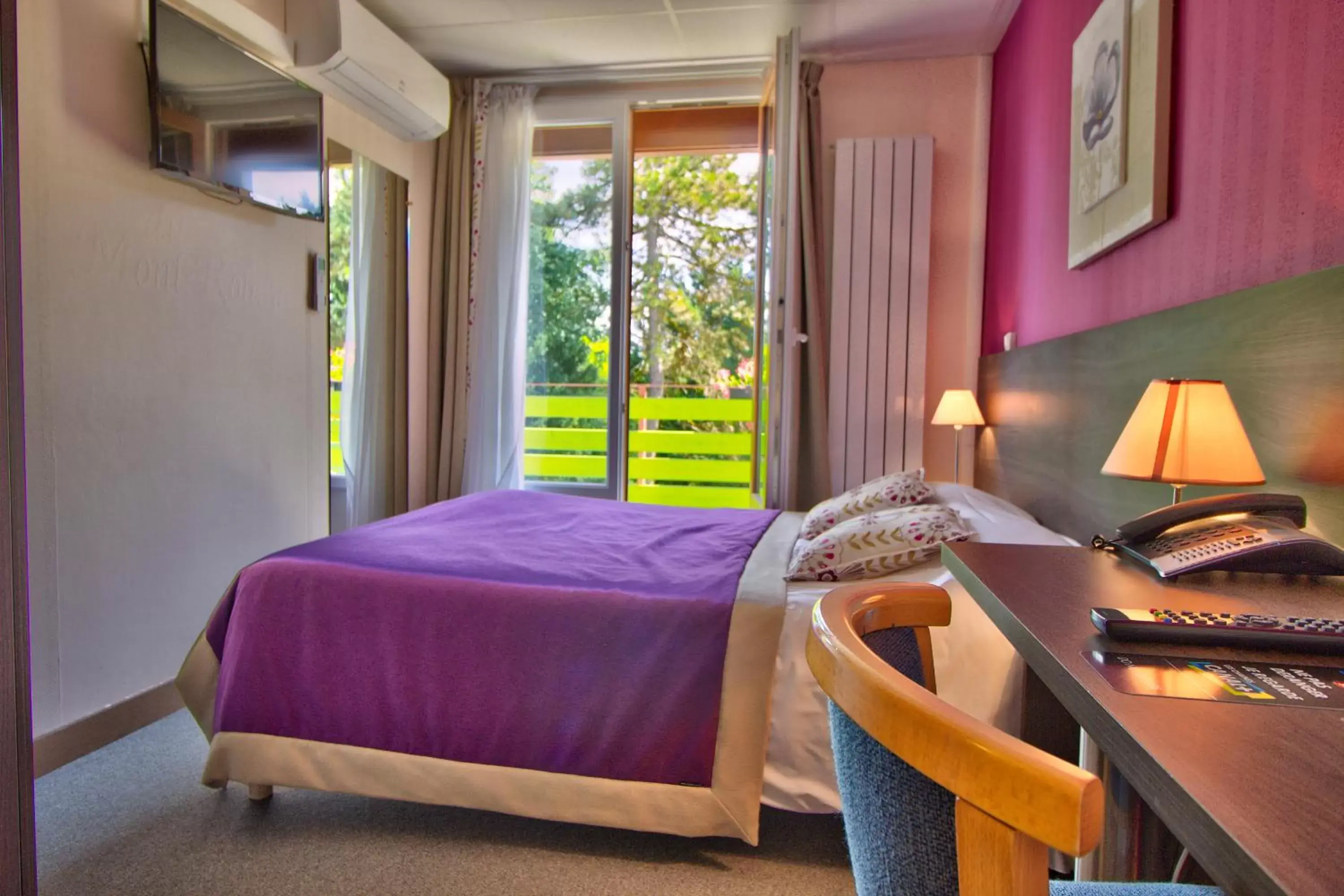 Bed in Logis Hôtel Restaurant Le Chalet du Mont Roland Bed in Logis Hôtel Restaurant Le Chalet du Mont Roland