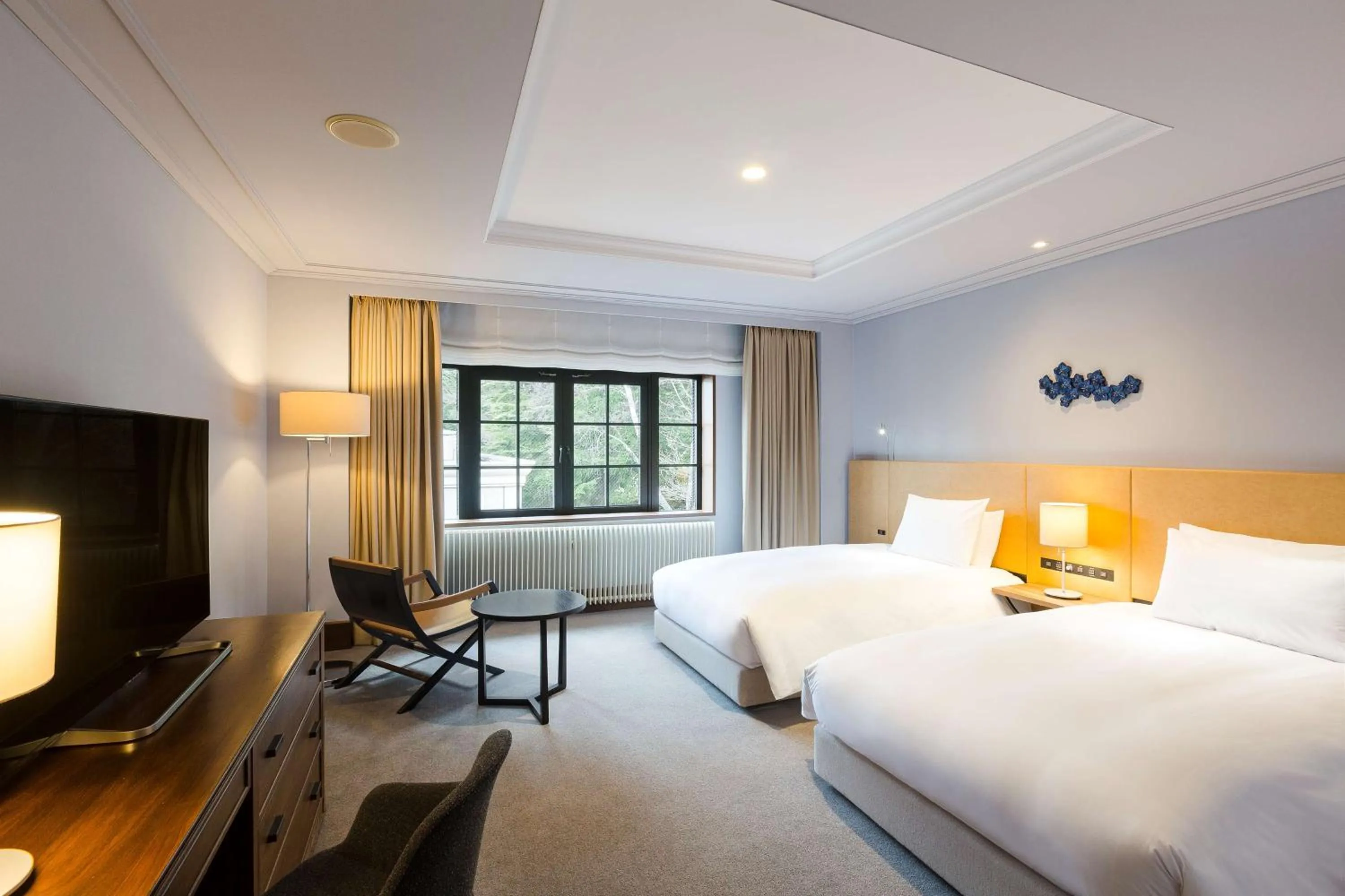 Bed in Kyukaruizawa Kikyo, Curio Collection by Hilton