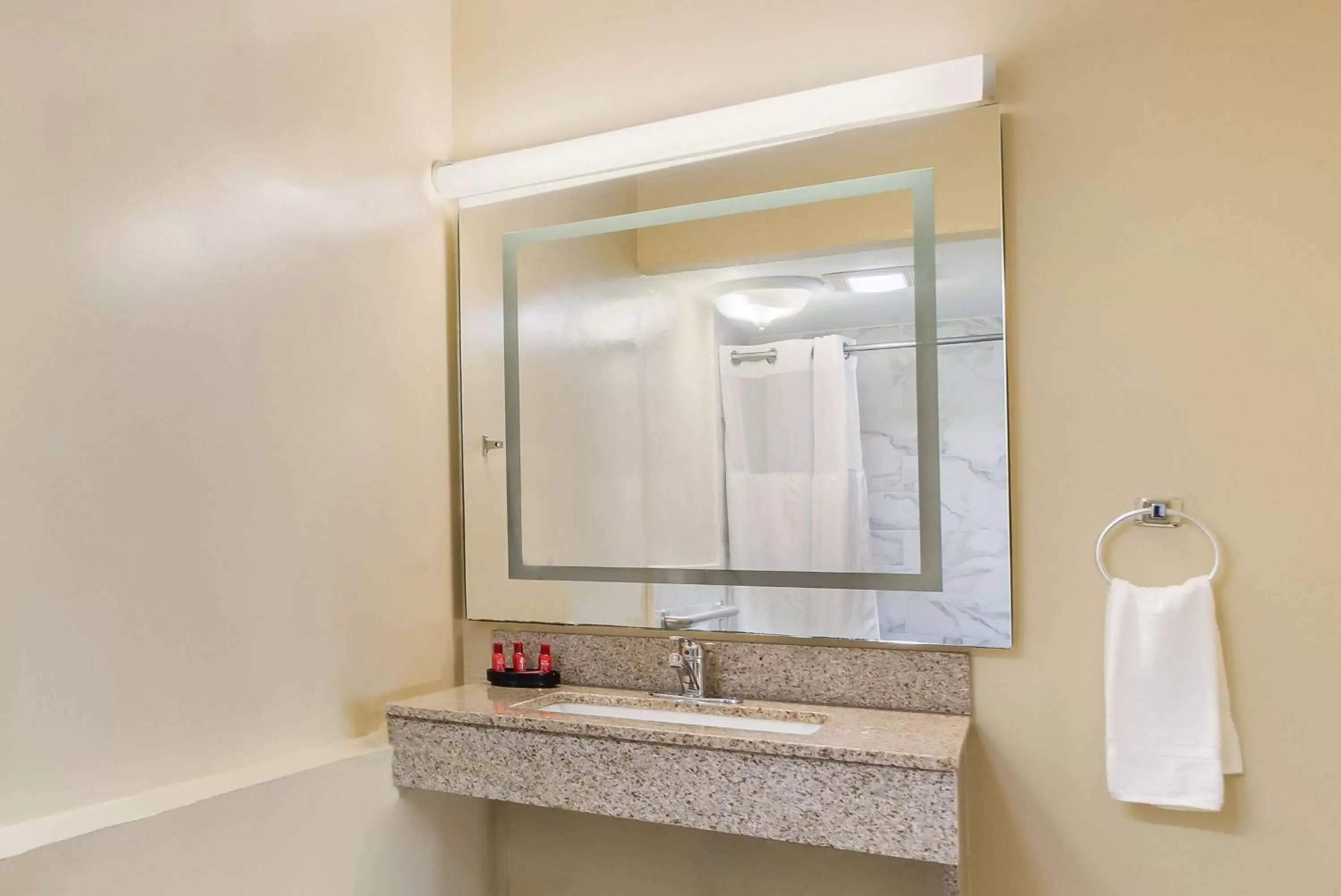 Bathroom in SureStay Hotel by Best Western Sarasota Lido Beach