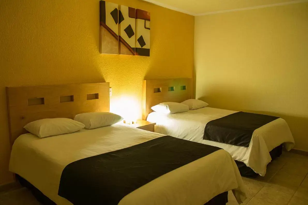 Bed in Hotel Posada Santa Bertha