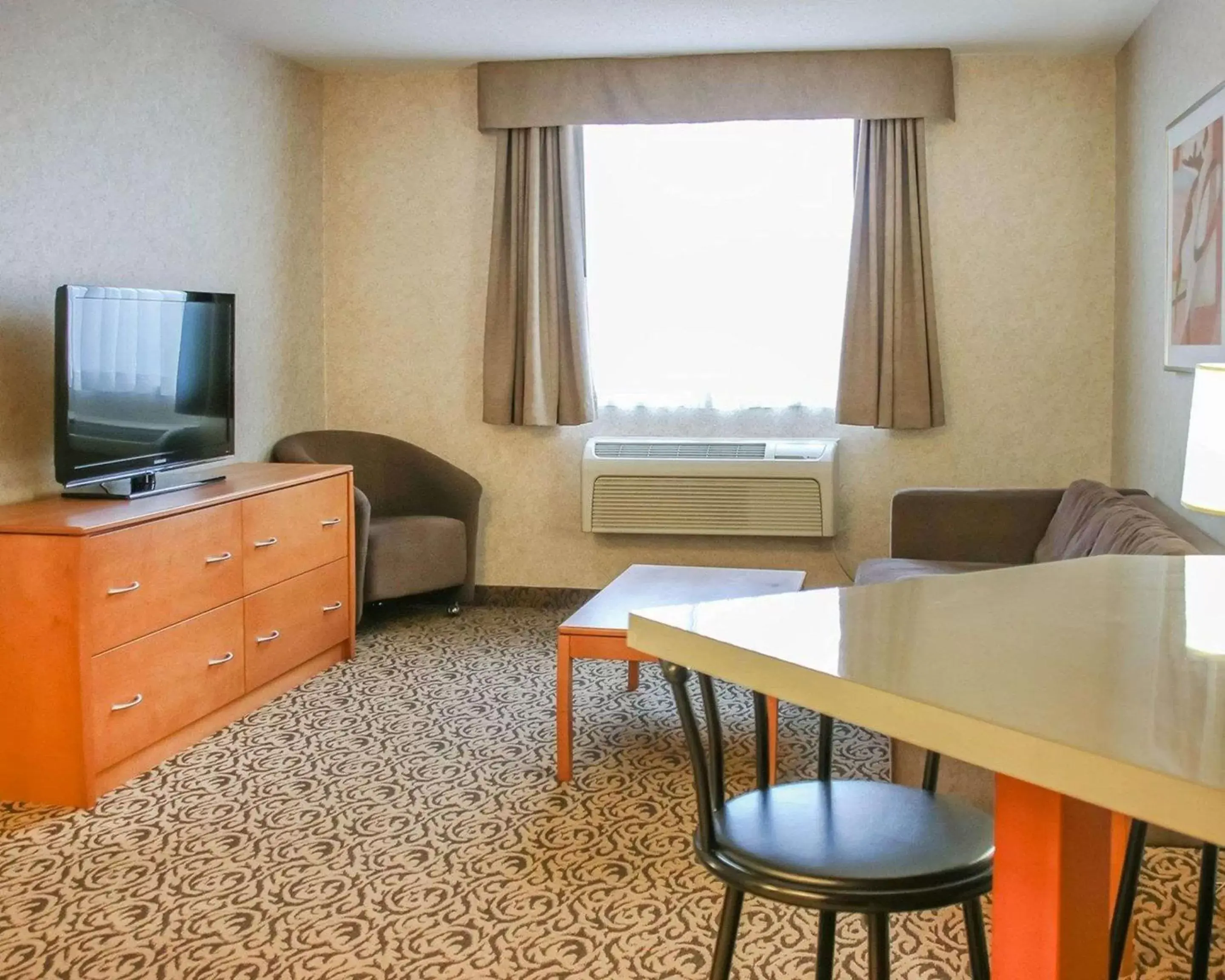 Photo of the whole room, TV/Entertainment Center in Quality Inn & Suites Winnipeg